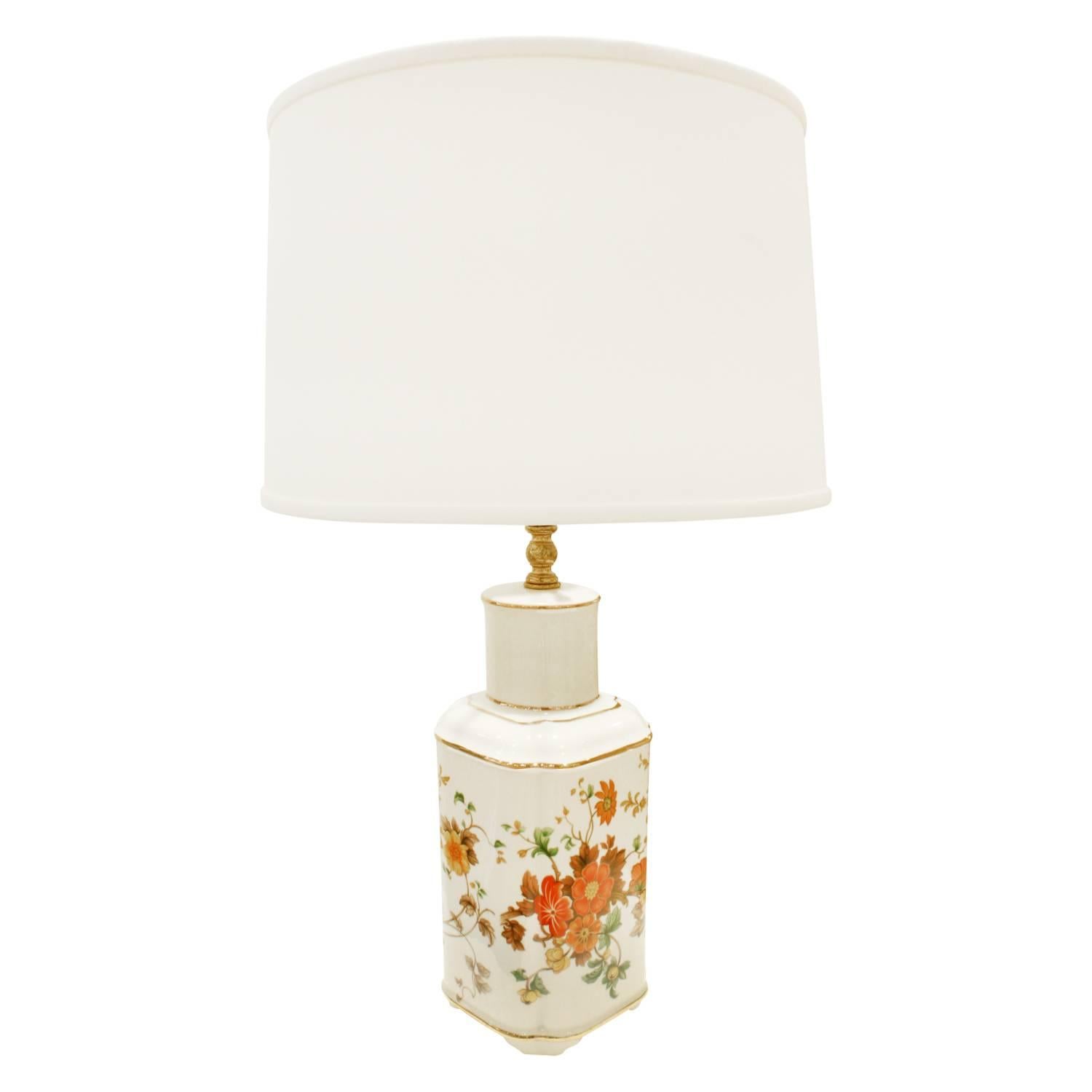 Small artisan porcelain table lamp with hand-painted flowers and gold accents, American 1960s (signed on bottom in gold 