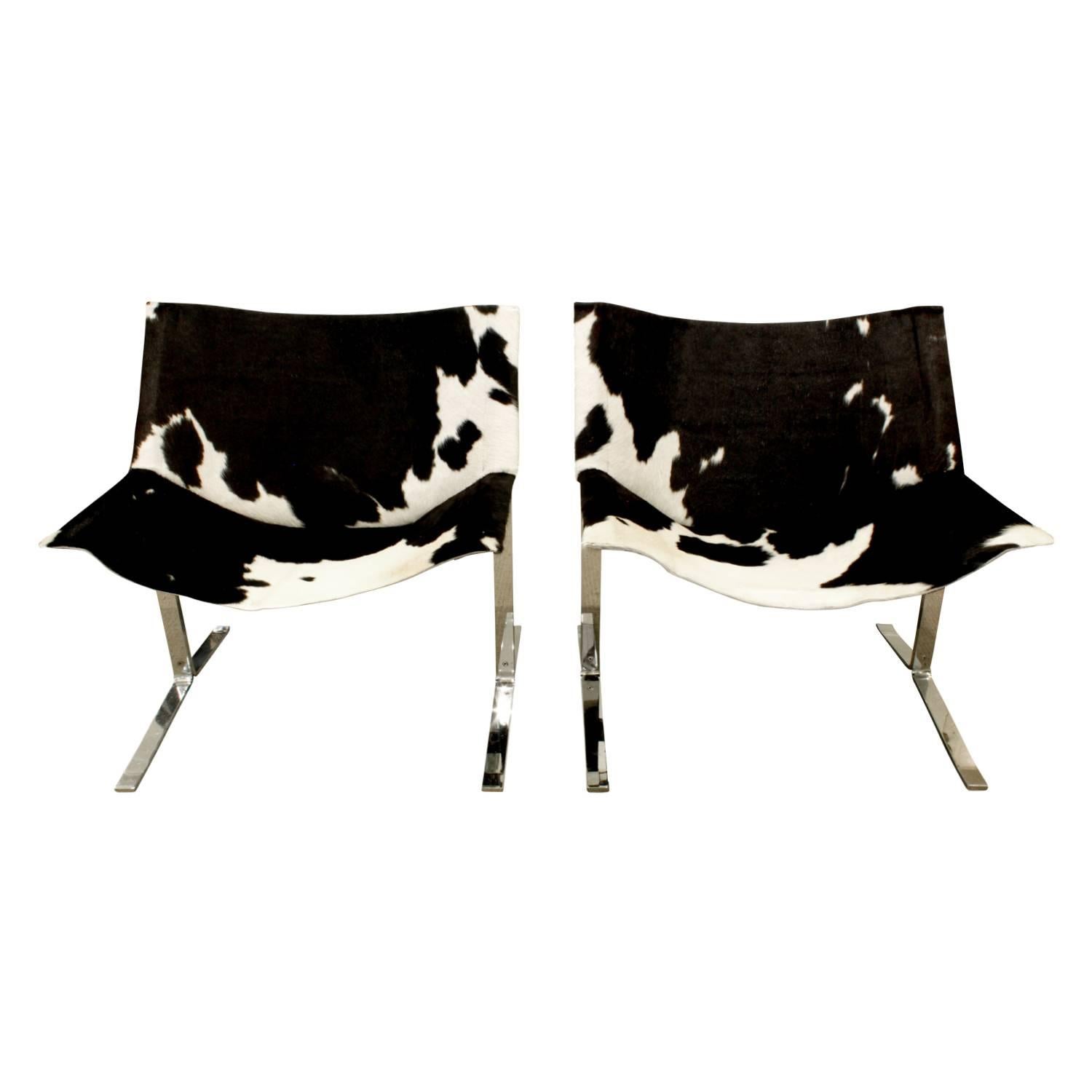 Chic Pair of Sling Chairs in Steel with Cow Hides, 1963
