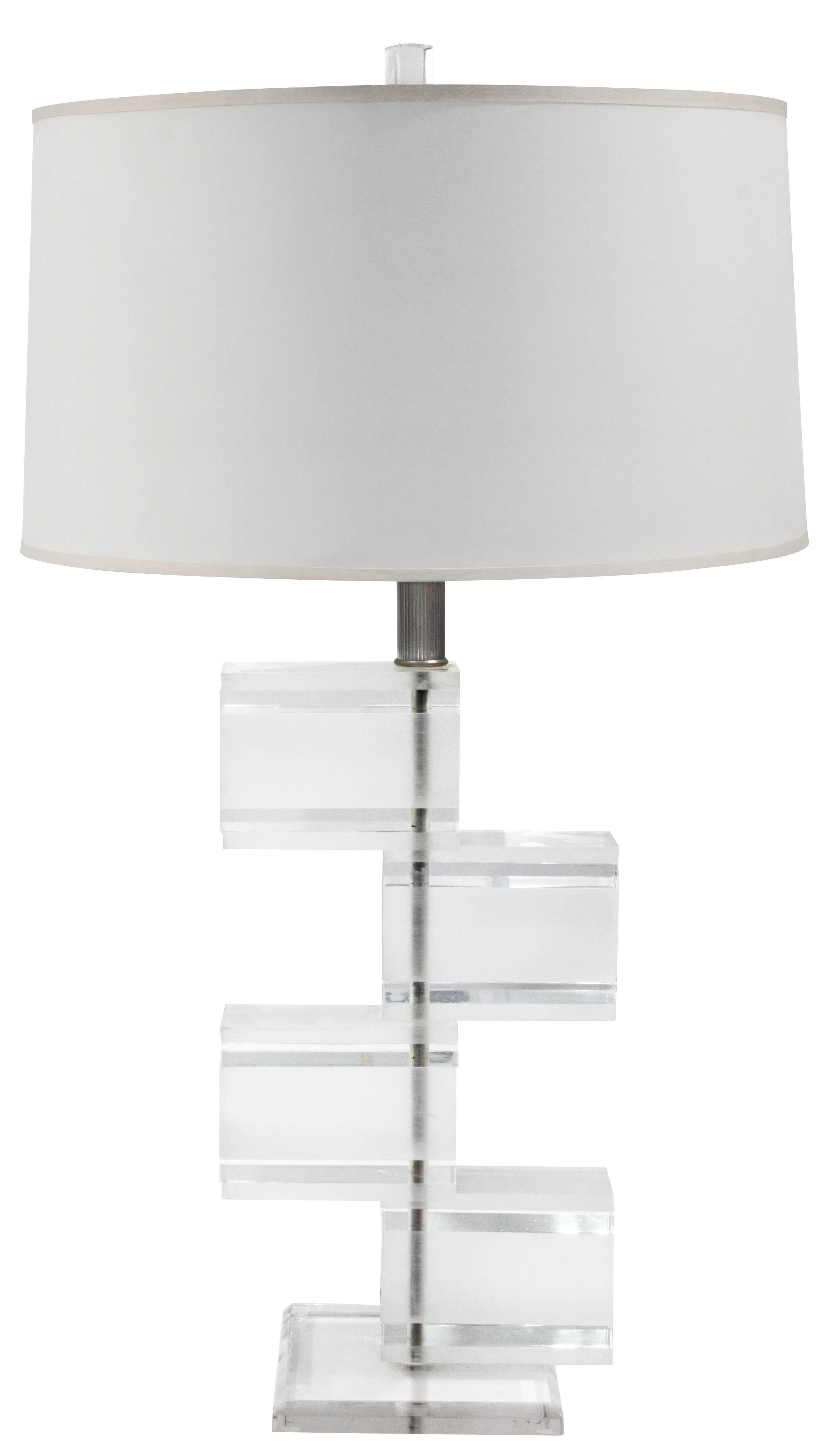 Pair of chic table lamps with stacked alternating clear and frosted sculpted lucite block design, American 1970's
