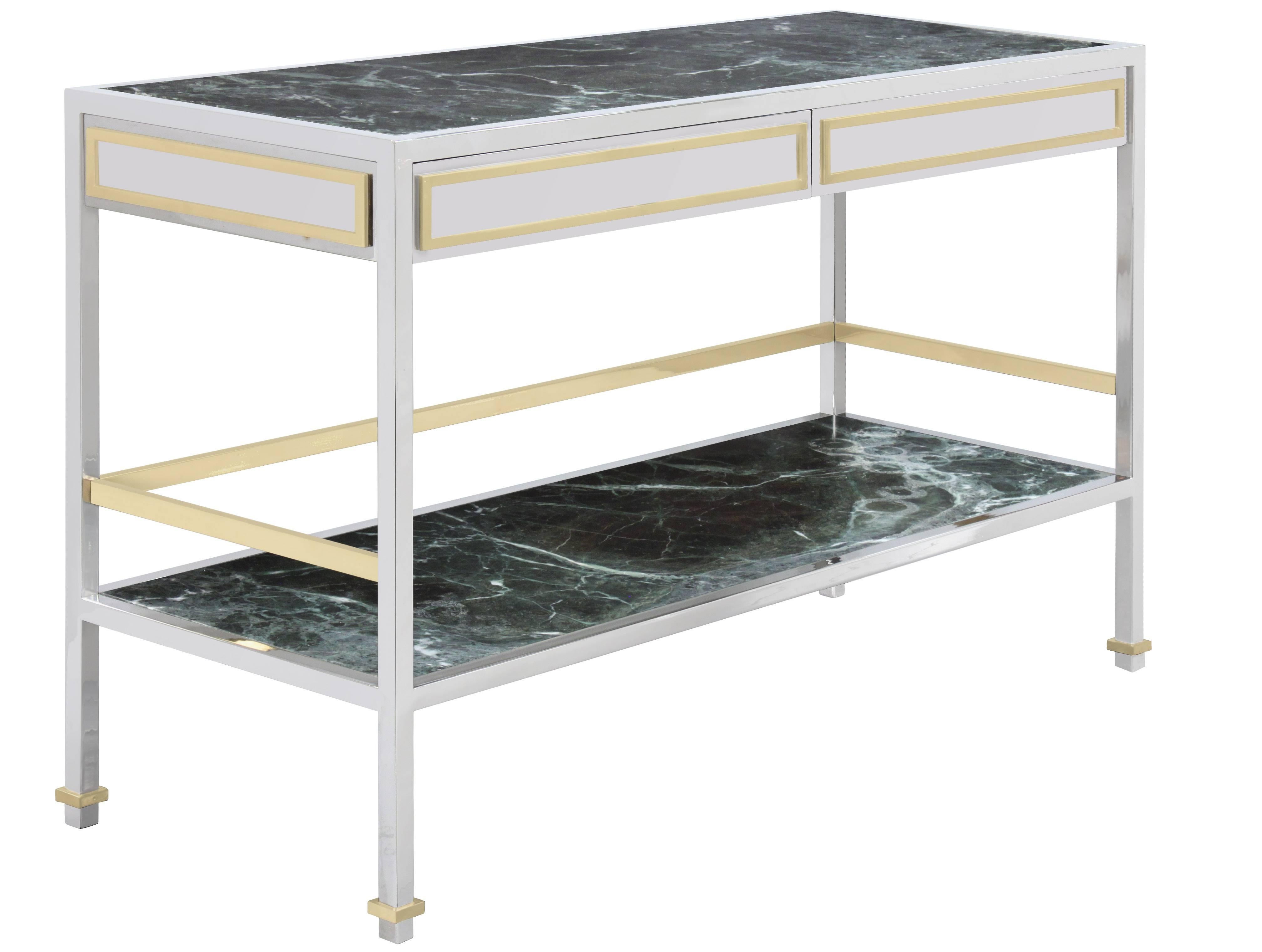 Chic console table/dry bar in polished steel and brass with inset marble top and shelf by Paul M. Jones, American 1970s.