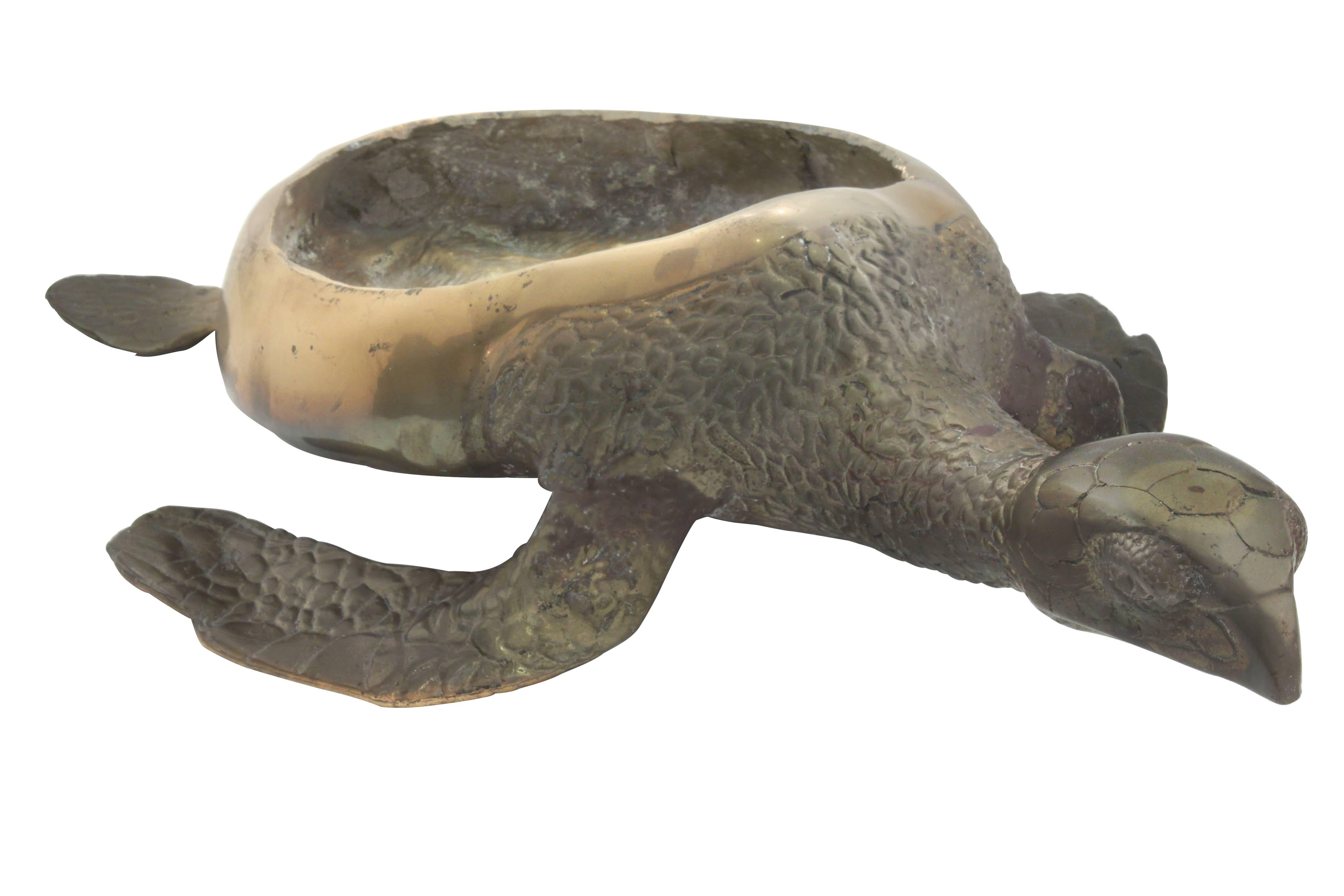 Solid brass sea turtle with removable shell to expose internal compartment, American, 1970s.