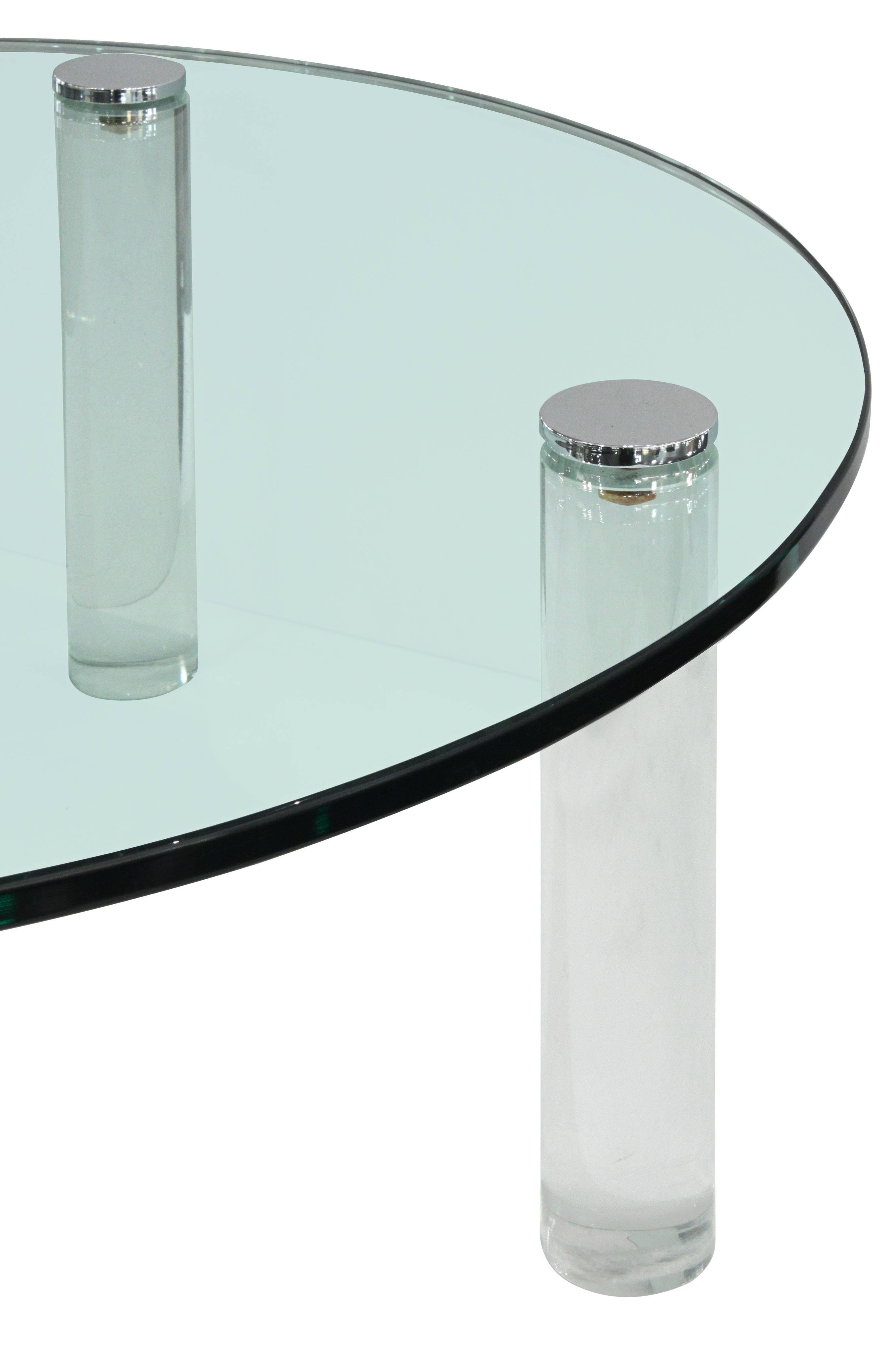 Coffee table with round solid Lucite legs and glass top with nickel hardware by Pace Collection, American, 1970s.
 