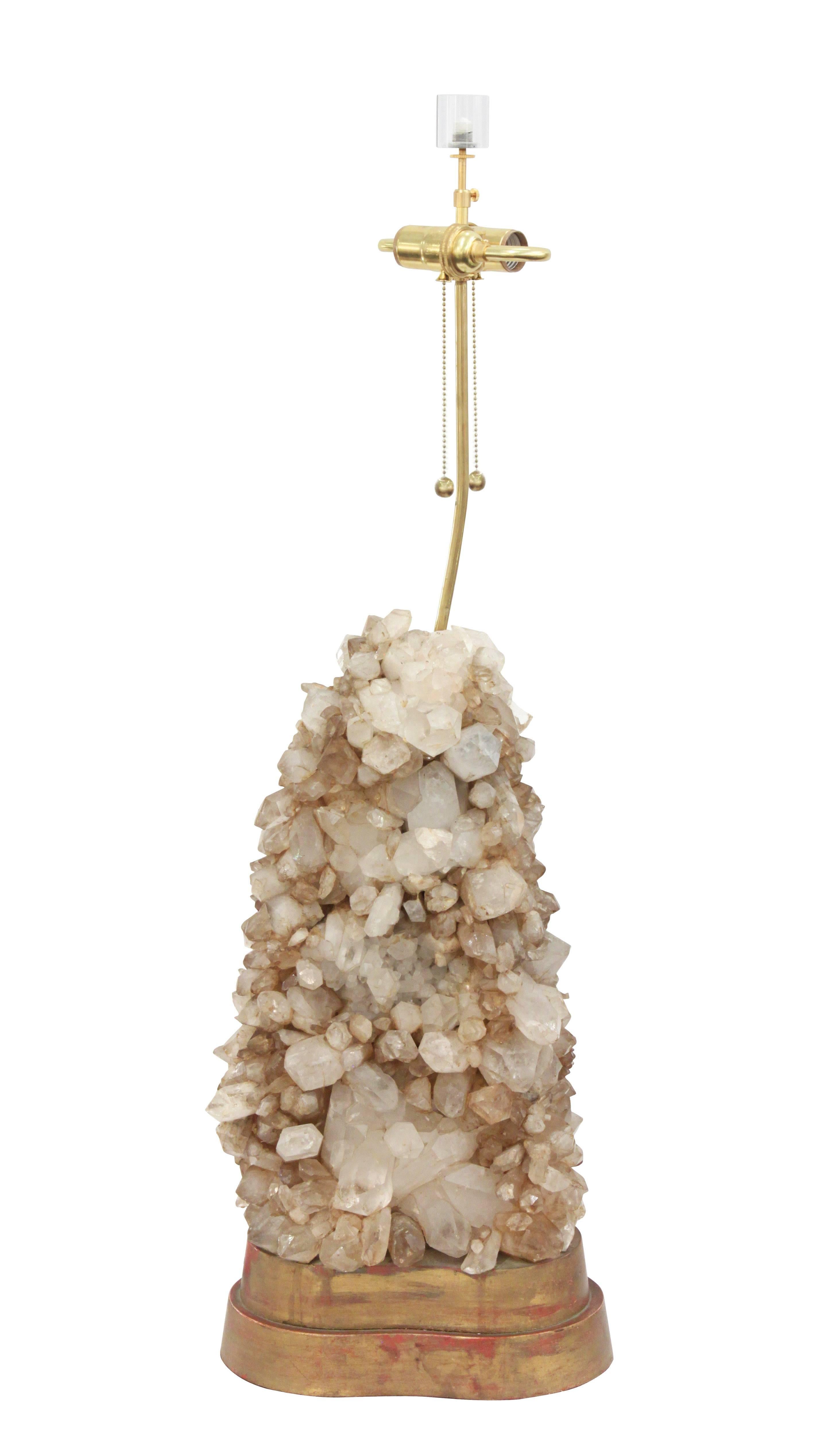 Large and exceptional studio made table lamp with quartz crystals by Carole Stupell, American, 1950s. Lamp shade in photo is 20 inches wide and 12 1/2 inches deep.
    