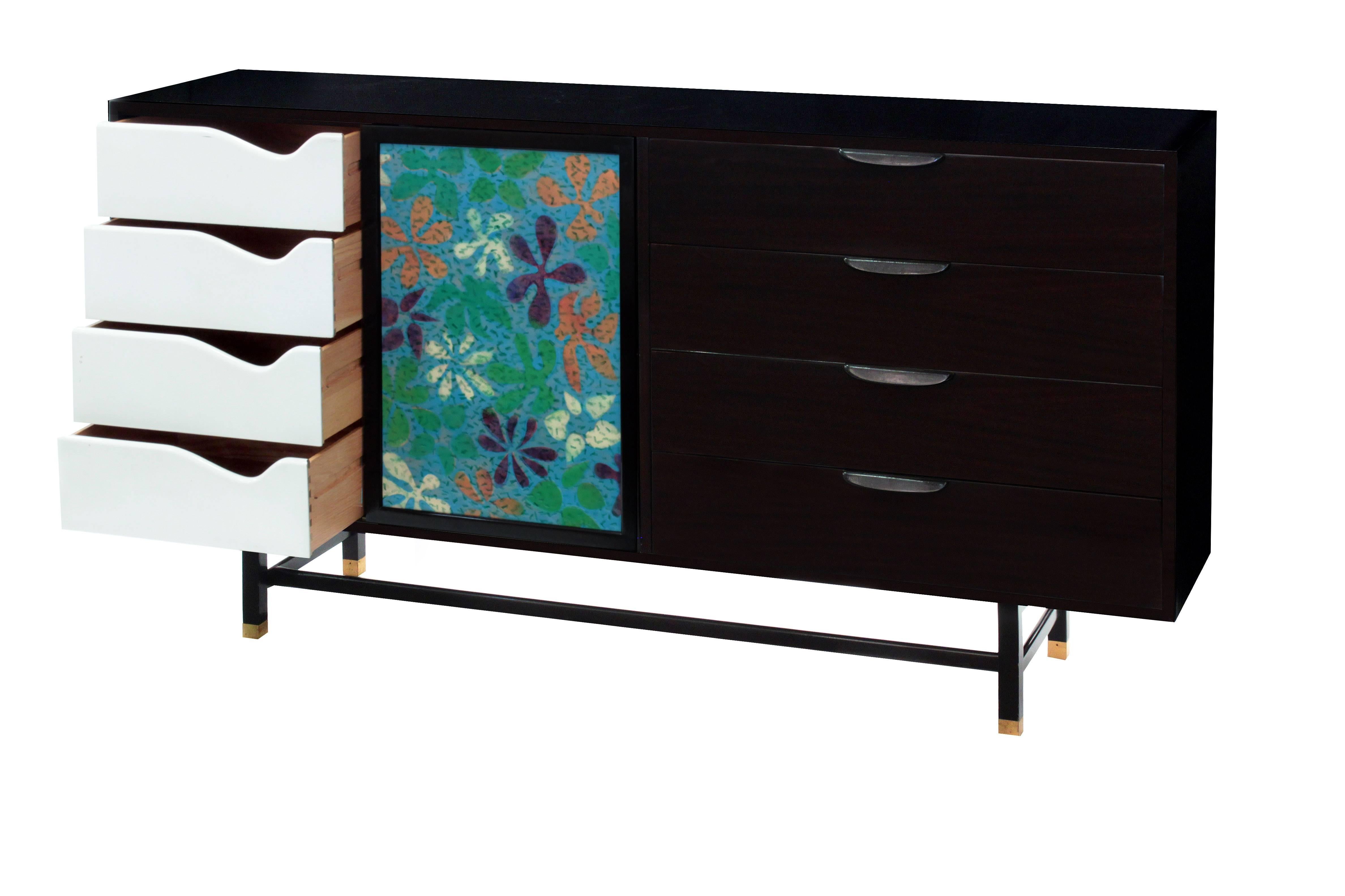 Cabinet No.1079 in mahogany with two doors inset with jewelry enamel on copper graphic flower design and rosewood pulls by Harvey Probber, American, 1950s (signed). Harvey Probber's name is synonymous with exceptional craftsmanship. Probber looked
