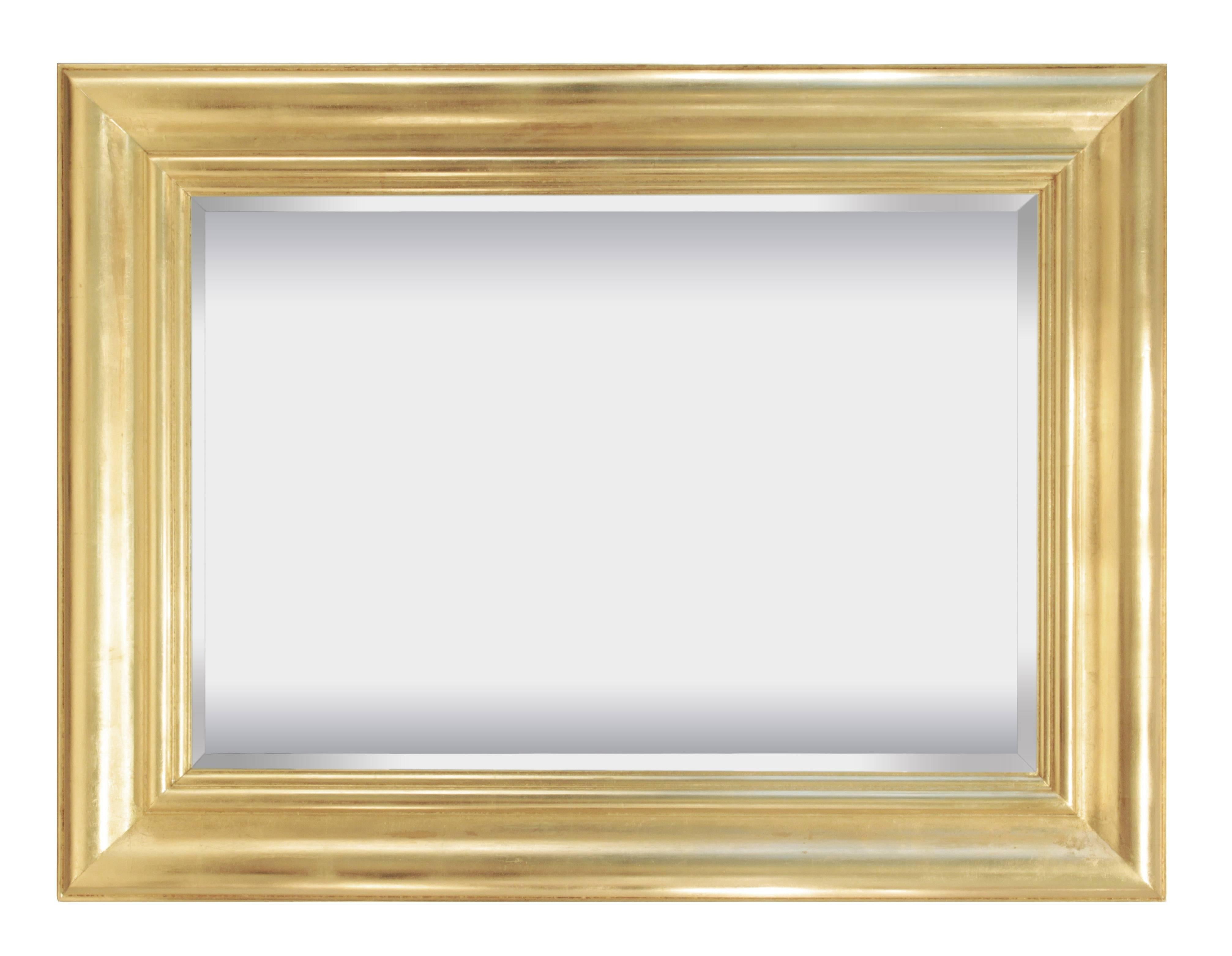 Rectangular wall-hanging mirror with frame in lacquered gold-leaf by Karl Springer, American 1980's. This mirror can hang vertically or horizontally.  This mirror is beautifully made and very luxurious.