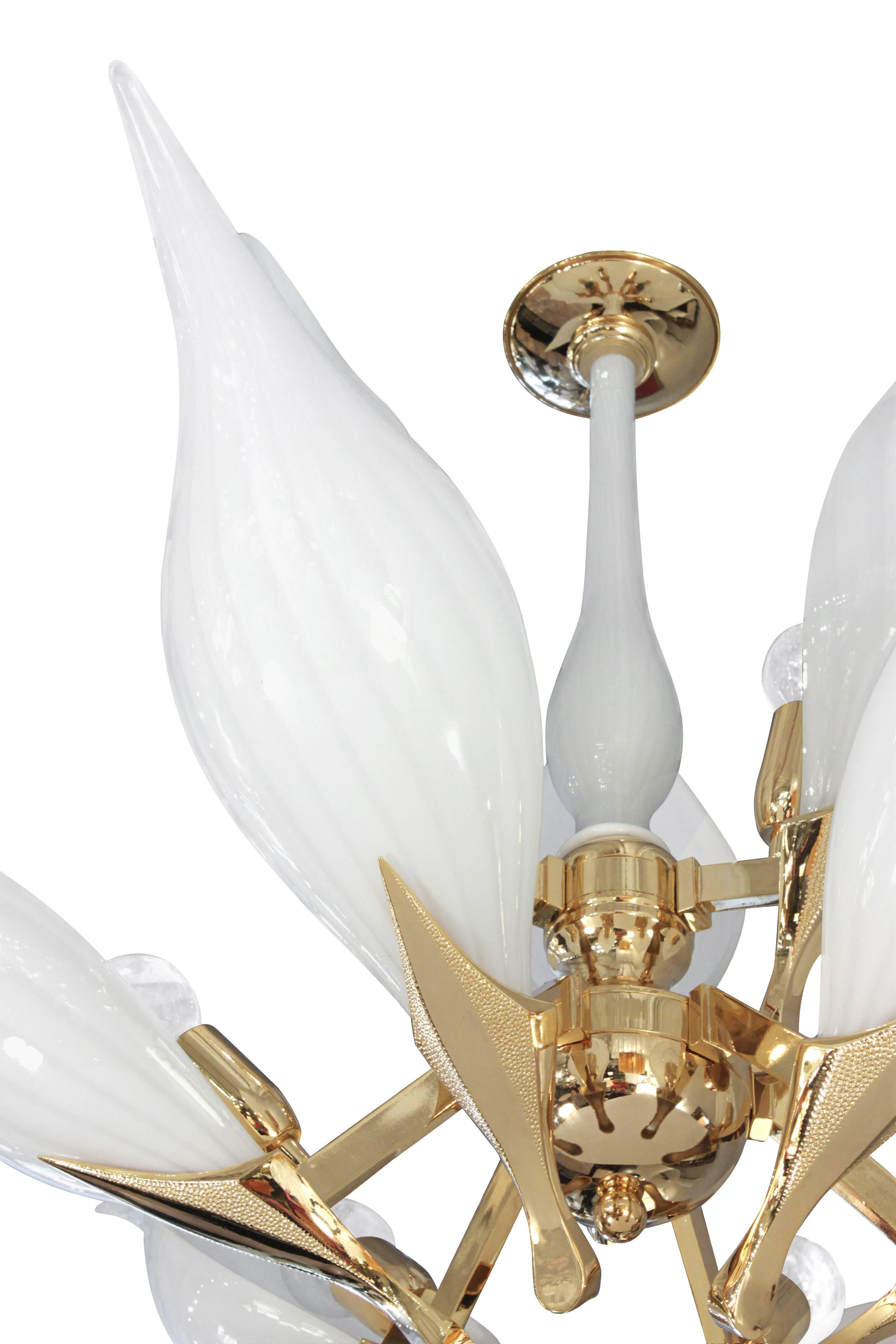 Elegant two-tier chandelier with striated glass petals and gold-plated hardware by Franco Luce, Murano Italy, 1970s.
Height of chandelier is 23 inches without chain and canopy.