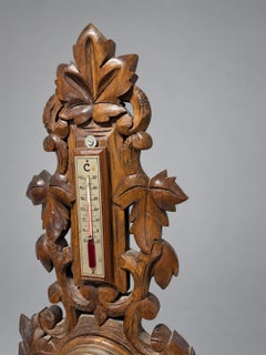 Black Forest Style Carved Aneroid Barometer and Thermometer, c. 1890