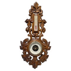 Black Forest Style Carved Aneroid Barometer and Thermometer, c. 1890