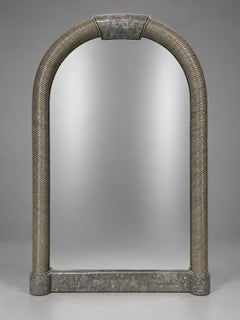 Karl Springer Style Arched Tessellated Stone & Rattan Mirror, American, 1980s
