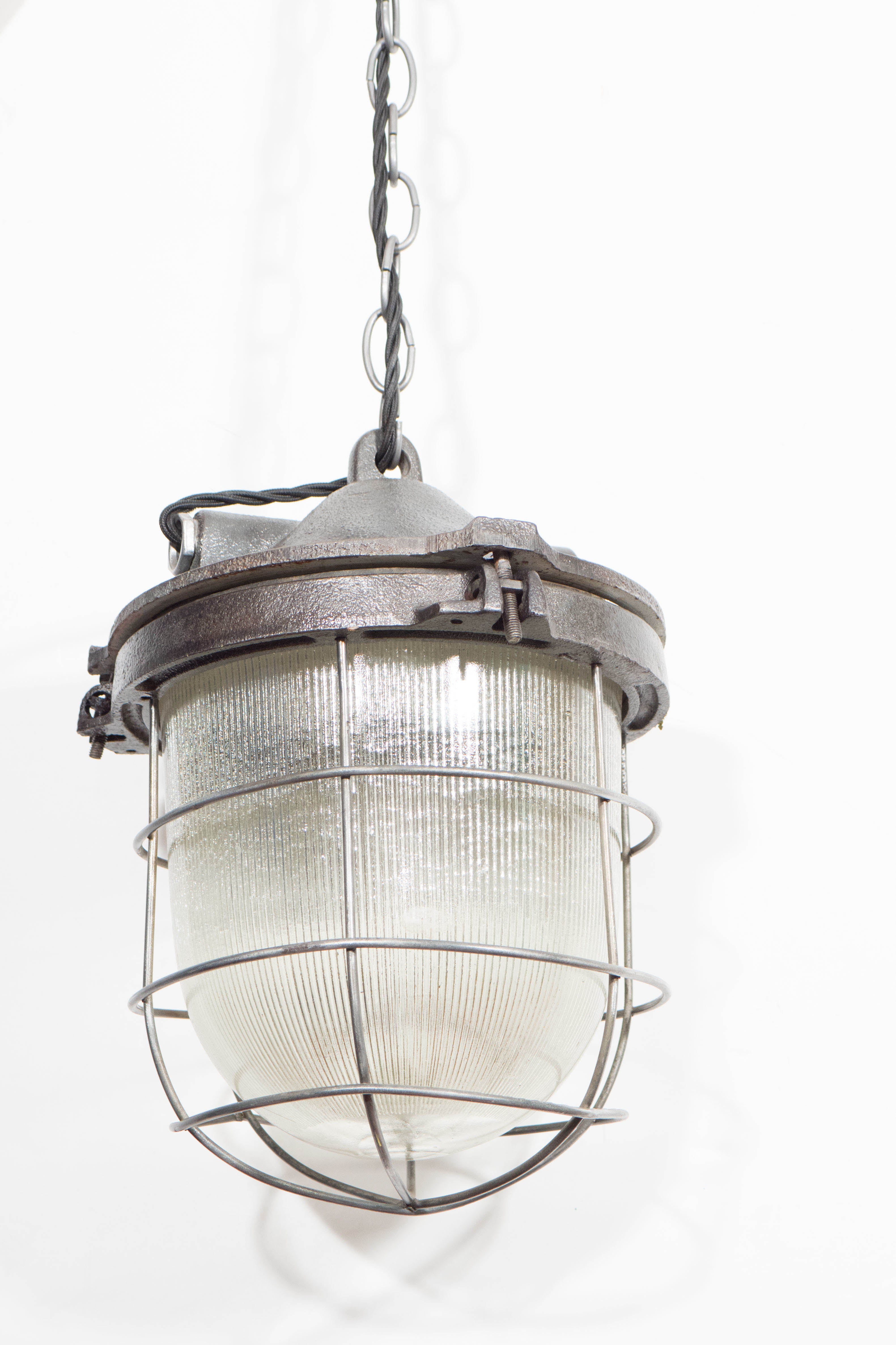 Cast Iron Cage Light with Ribbed Glass For Sale