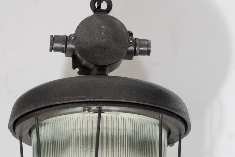 20th Century Industrial Cage Light with Ribbed Glass For Sale