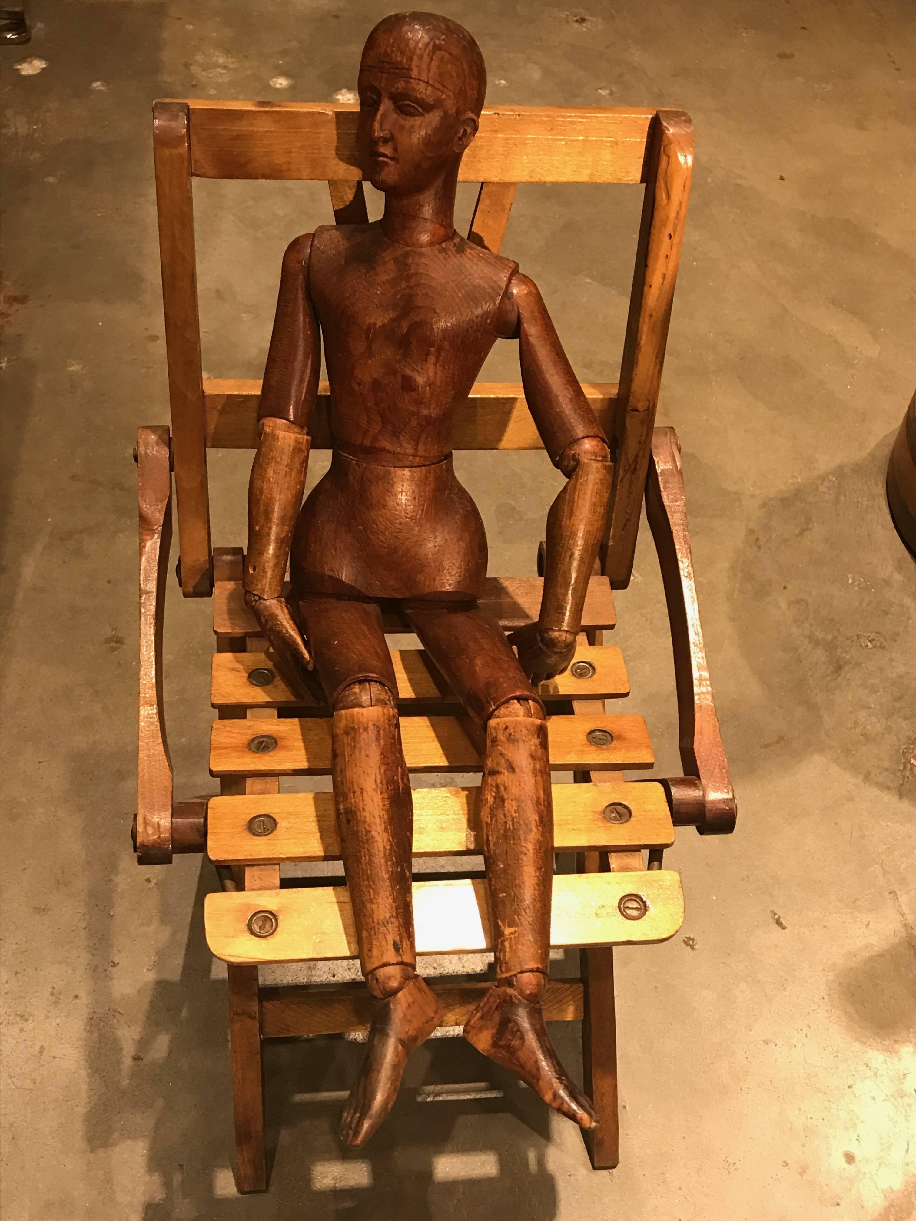 Incredible articulated Artist's mannequin from 19th C. France.

Used as an aid for Artist's depicting the human form. Hand carved and pegged for ease of changing the mannequin's position.

Fantastic original surface with an incredible face and