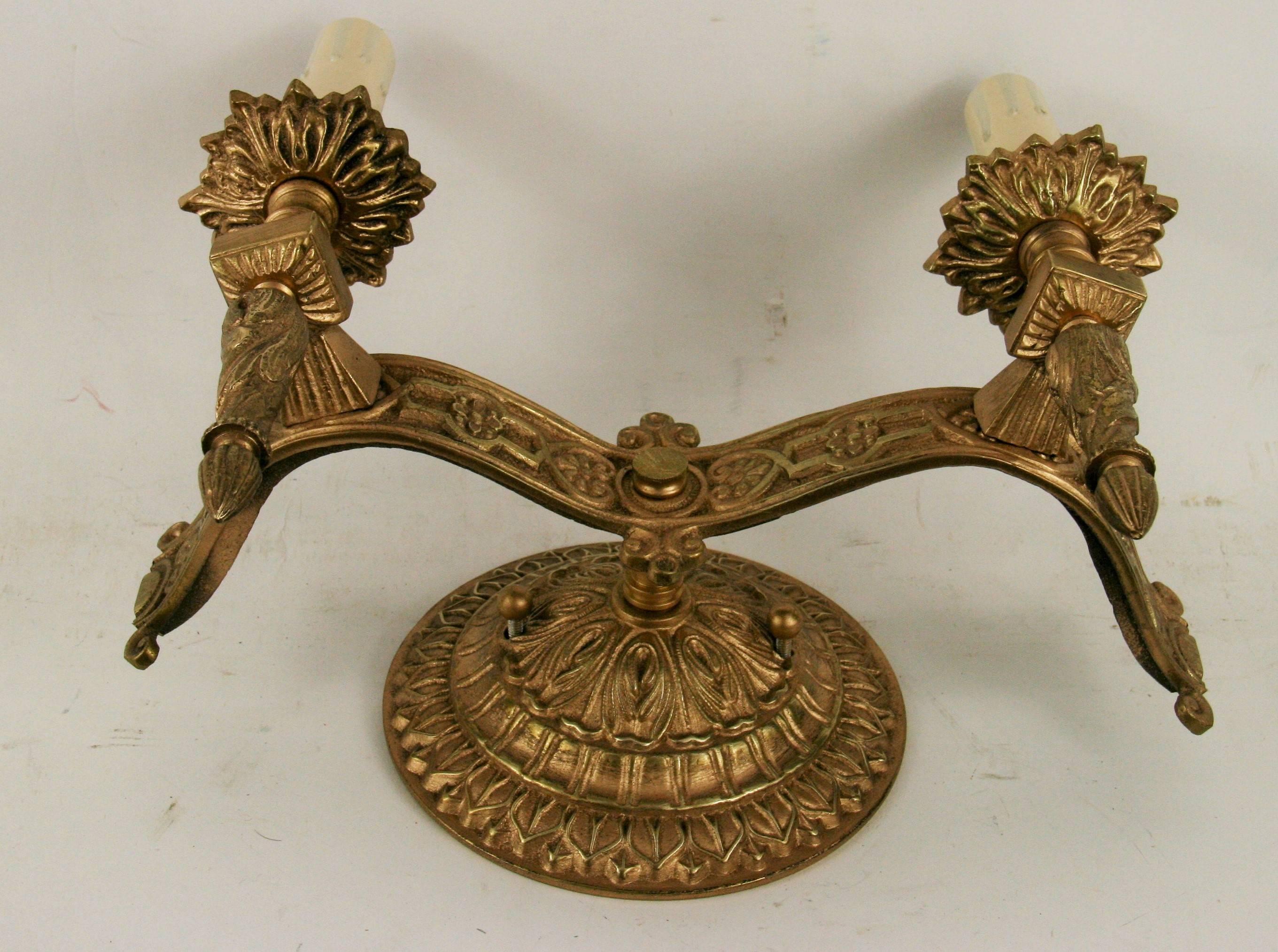 2-1814ab   Pair Italian bronze two-arm sconces with repose detailing.
Take two 60 watt candelabra based bulbs
Two pair available
Priced per pair.
NO ADDITIONAL DISCOUNTS ON SALE ITEM