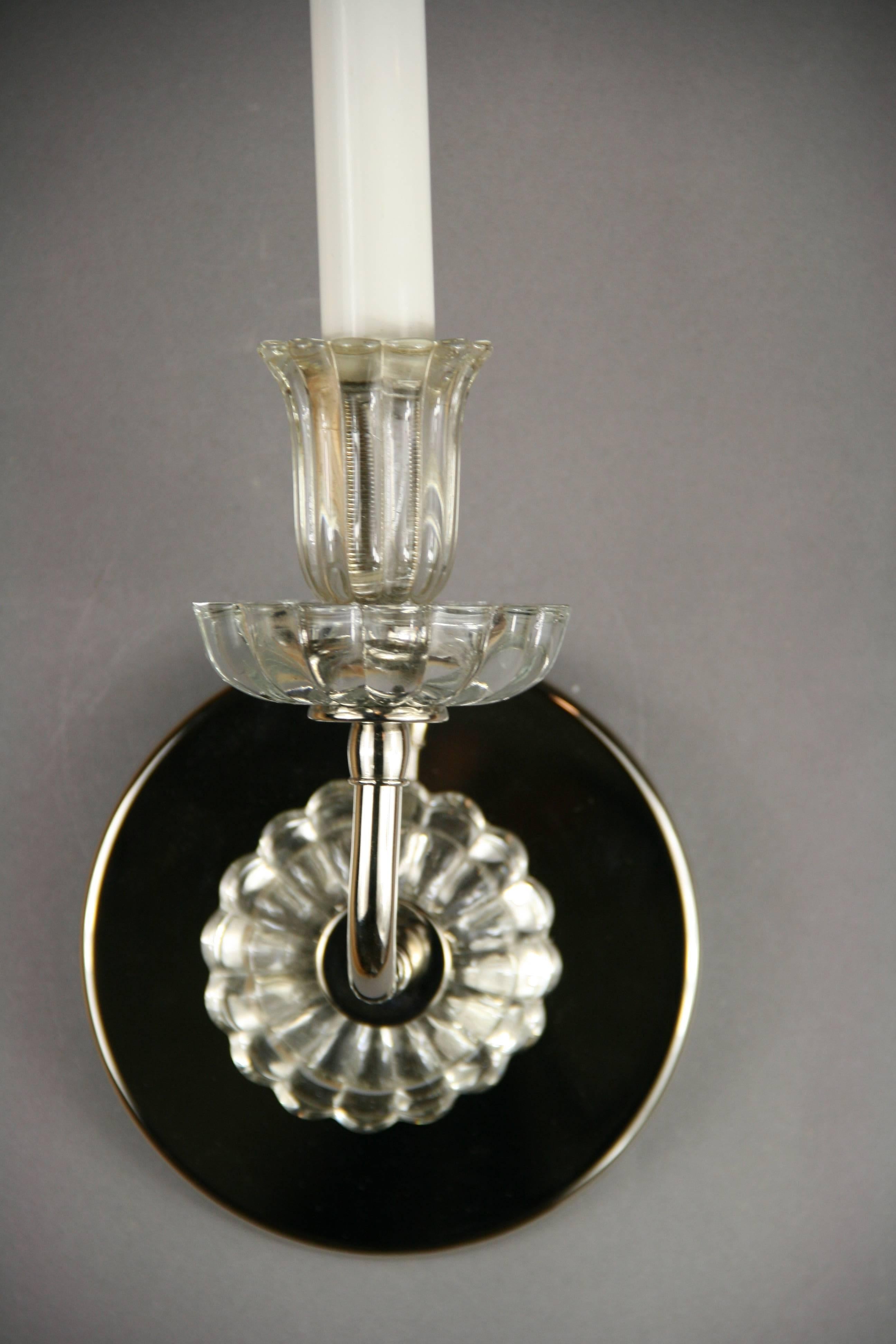 2-1828a pair of tulip glass sconces. Takes 60 watt candelabra bulb.
 