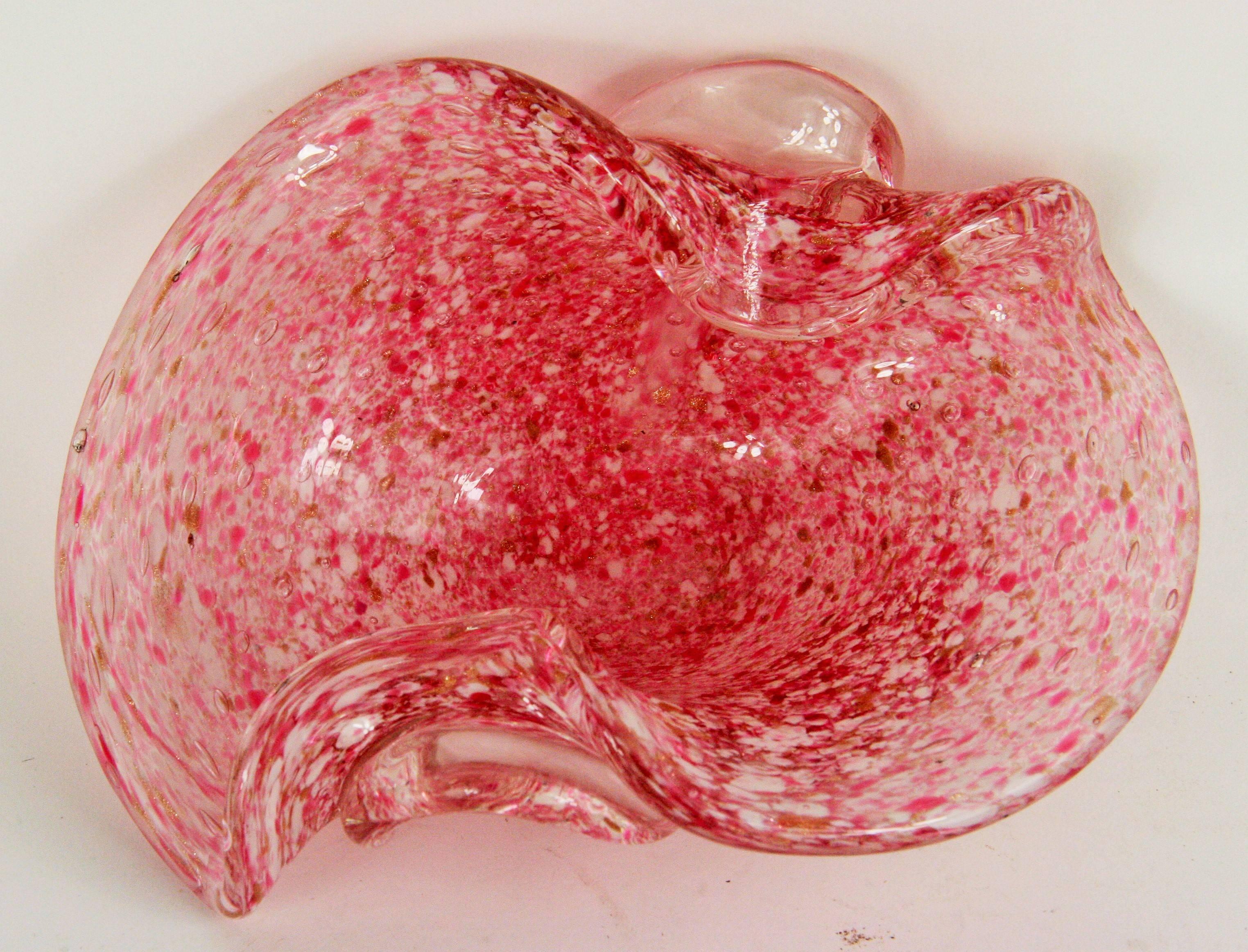 A red-gold dust Murano glass bowl, circa 1940.