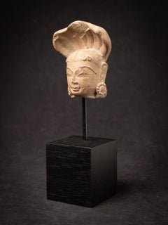 Antique sandstone head of a Nagini statue from India