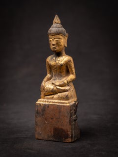 Antique wooden Thai Buddha statue from Thailand