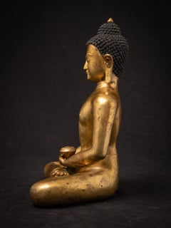 Old bronze Nepali gilded Buddha statue from Nepal