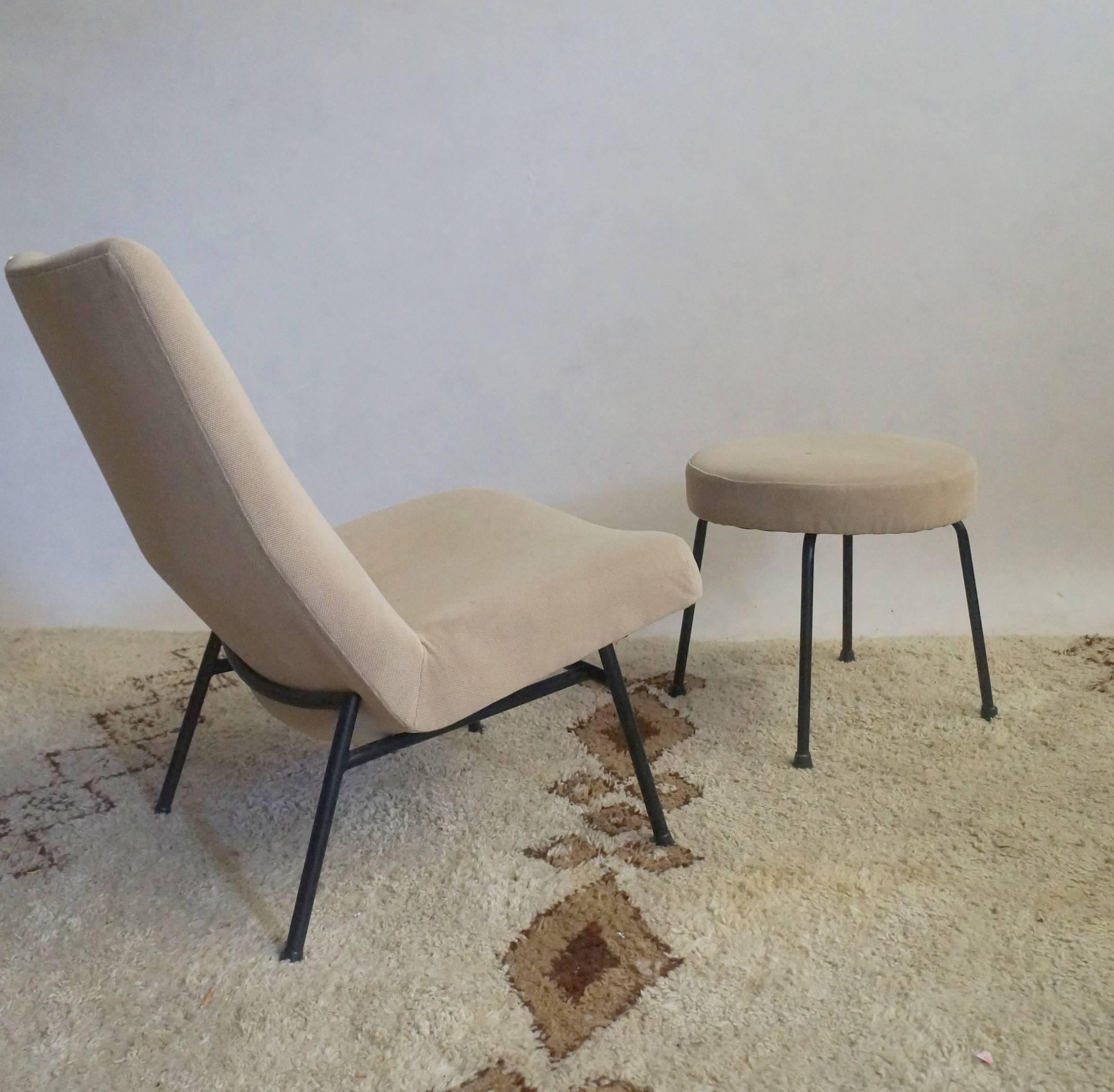 Pair of Pierre Guariche armchairs with matching stool. Original condition.