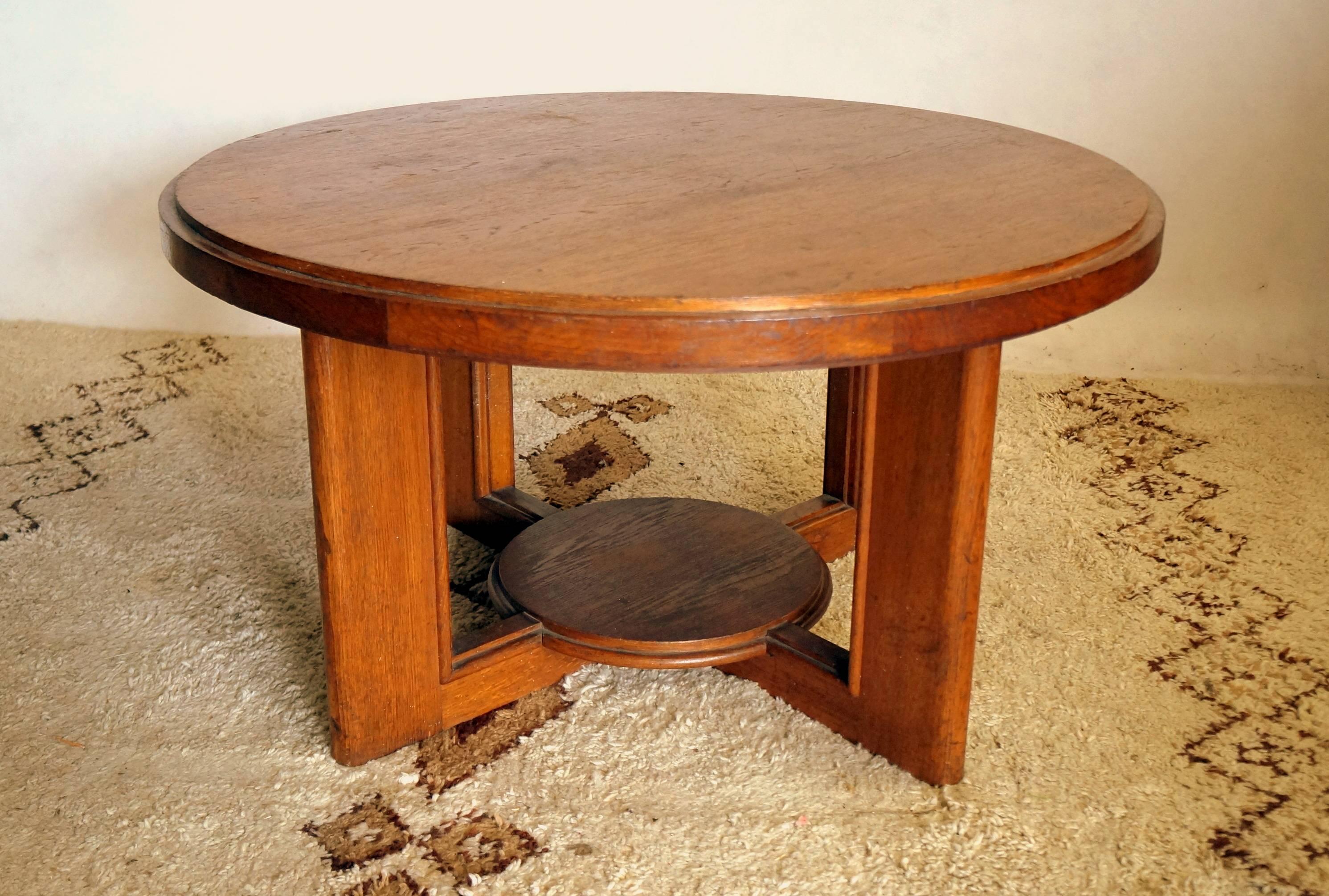 Oak large gueridon designed and made by Vallin in the 1930's 