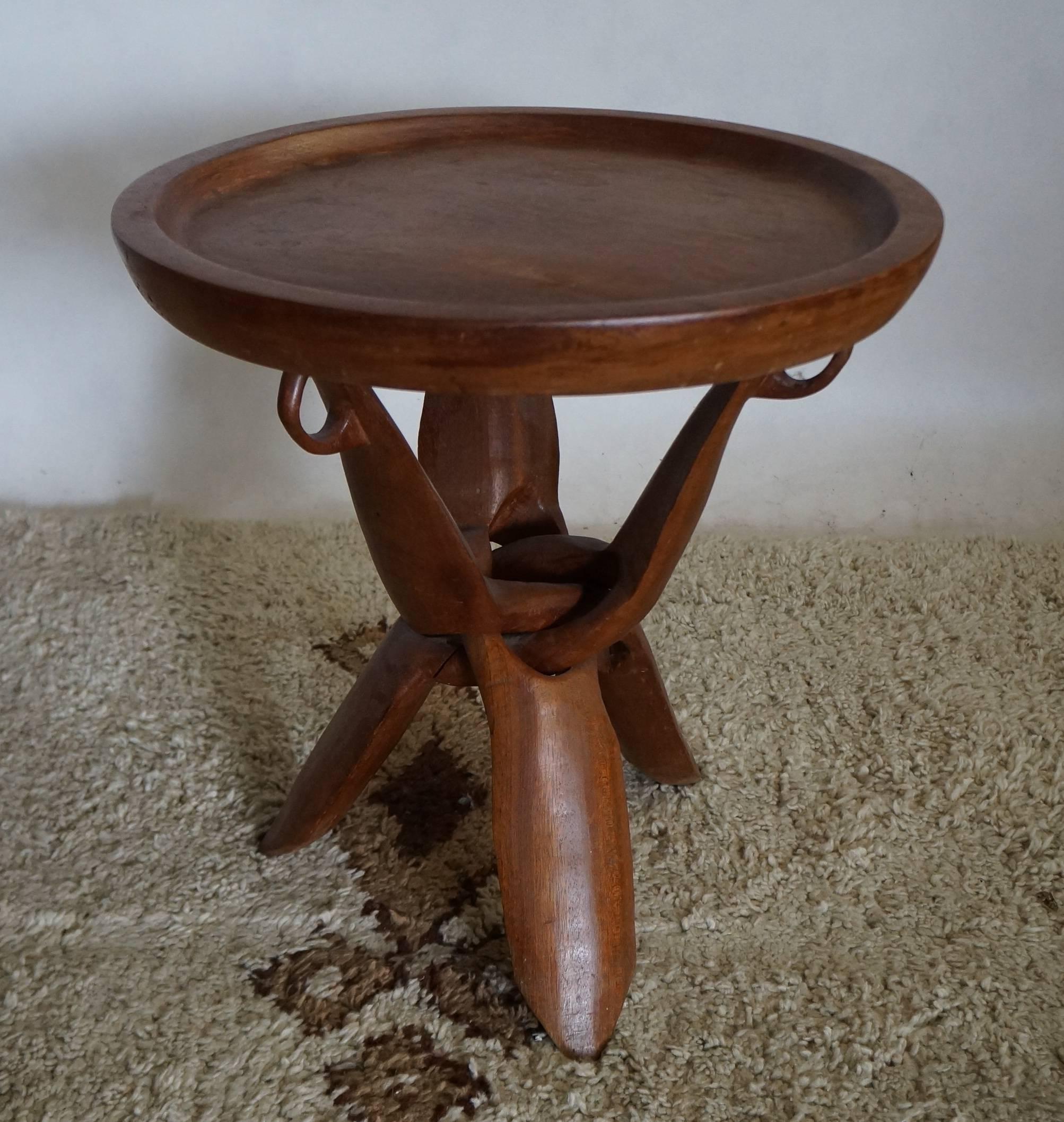 Exotic wood side table in original condition.
 
