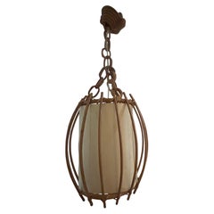 Suspension en rotin de style « Mid-Century Modern » par Louis Sognot, années 1960