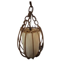 Suspension en rotin de style « Mid-Century Modern » par Louis Sognot, années 1960