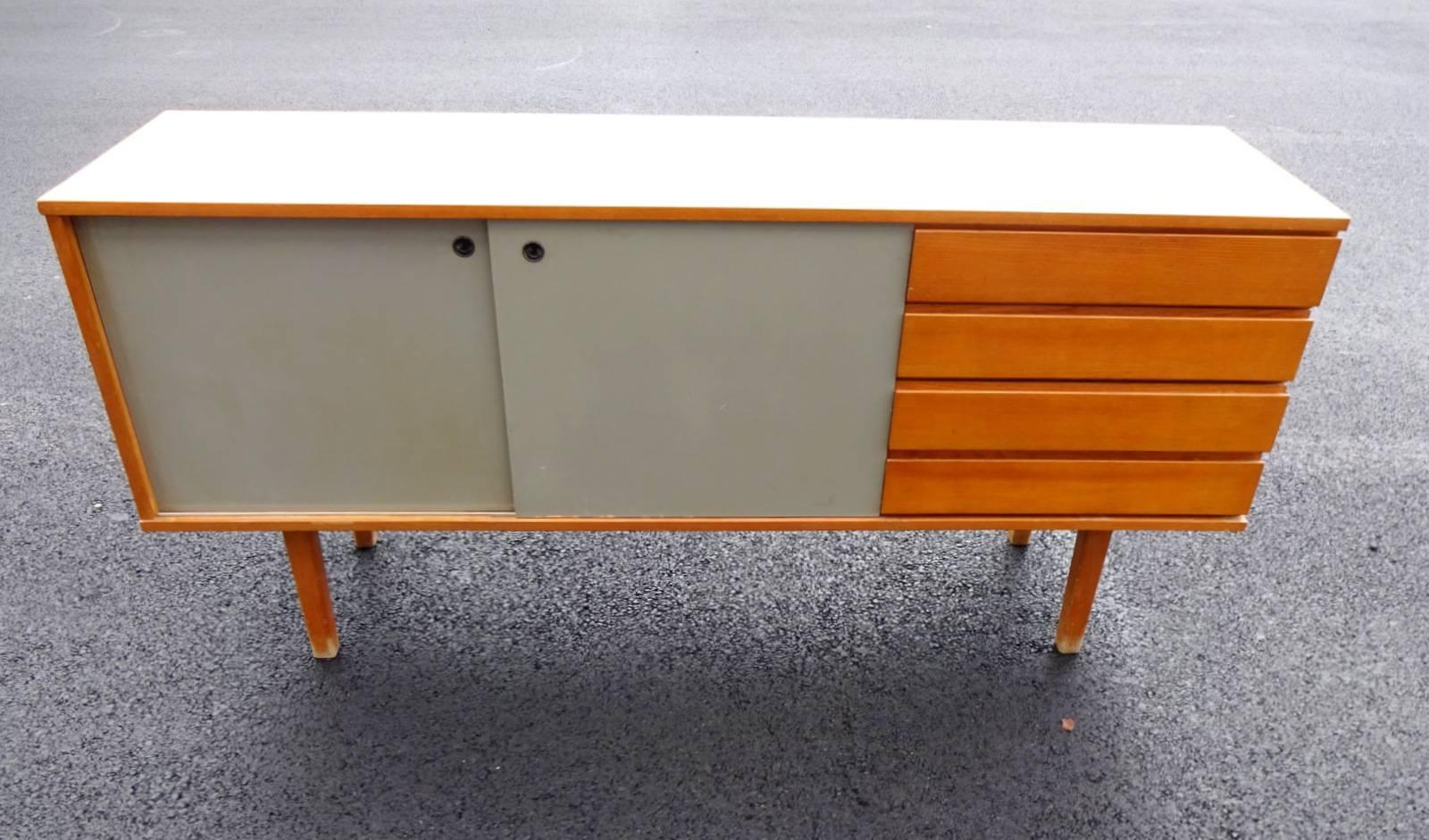 Cabinet in original condition from the 1950s designed by ARP
ARP stands for Atelier de Recherches Plastiques (Research Plastic Studio) and is composed by the famous designers Pierre Guariche, Joseph André Motte and Michel Mortier. This cabinet is