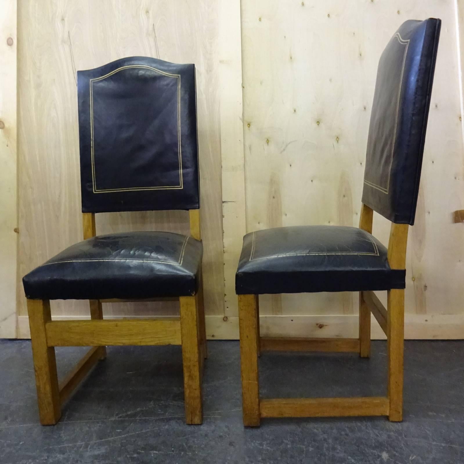 Set of four leather high back chairs in the manner of Jacques Adnet. Original condition
located in Brooklyn.
