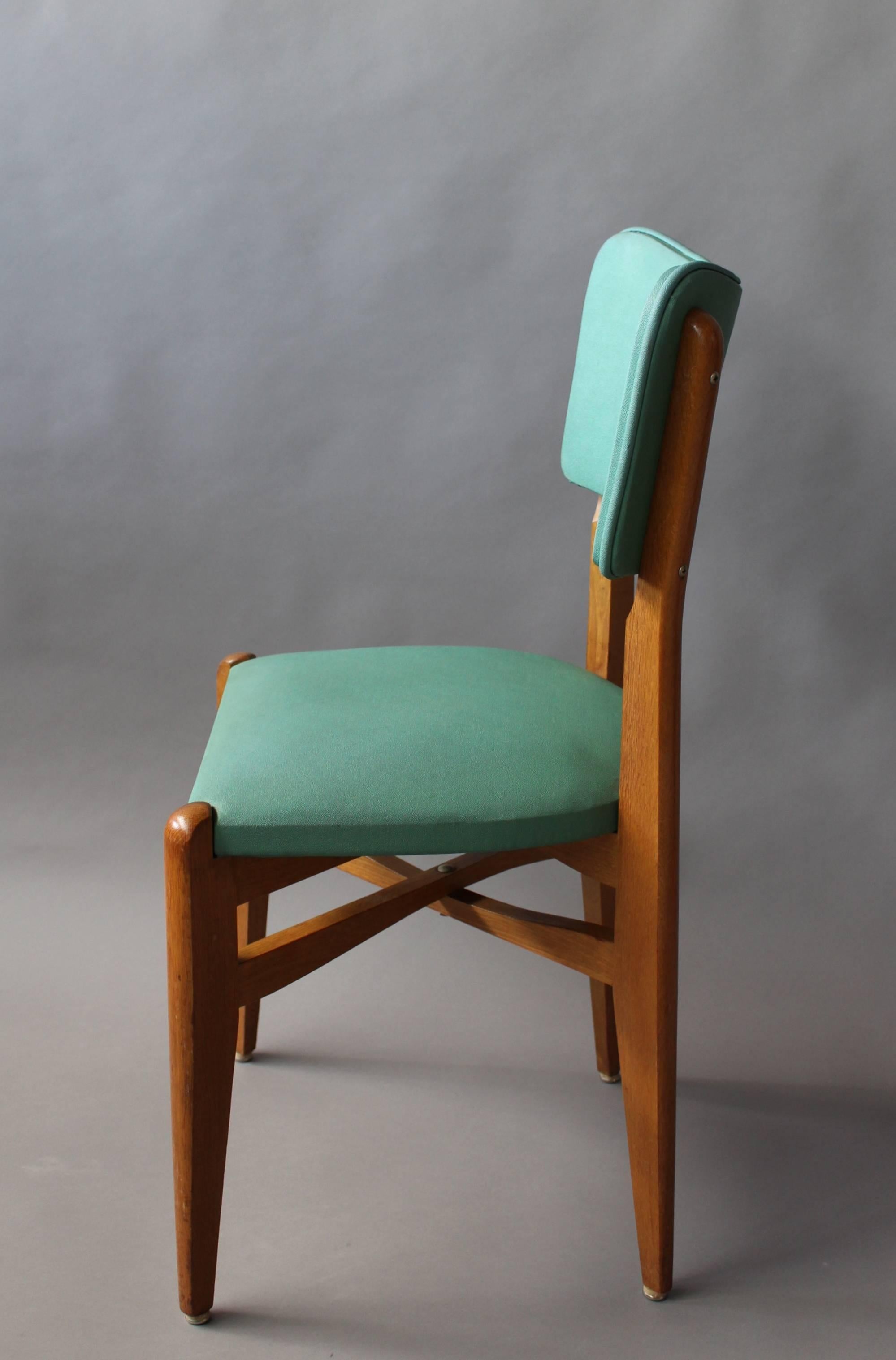 A set of 6 French 1950's Oak Chairs In Good Condition In Long Island City, NY