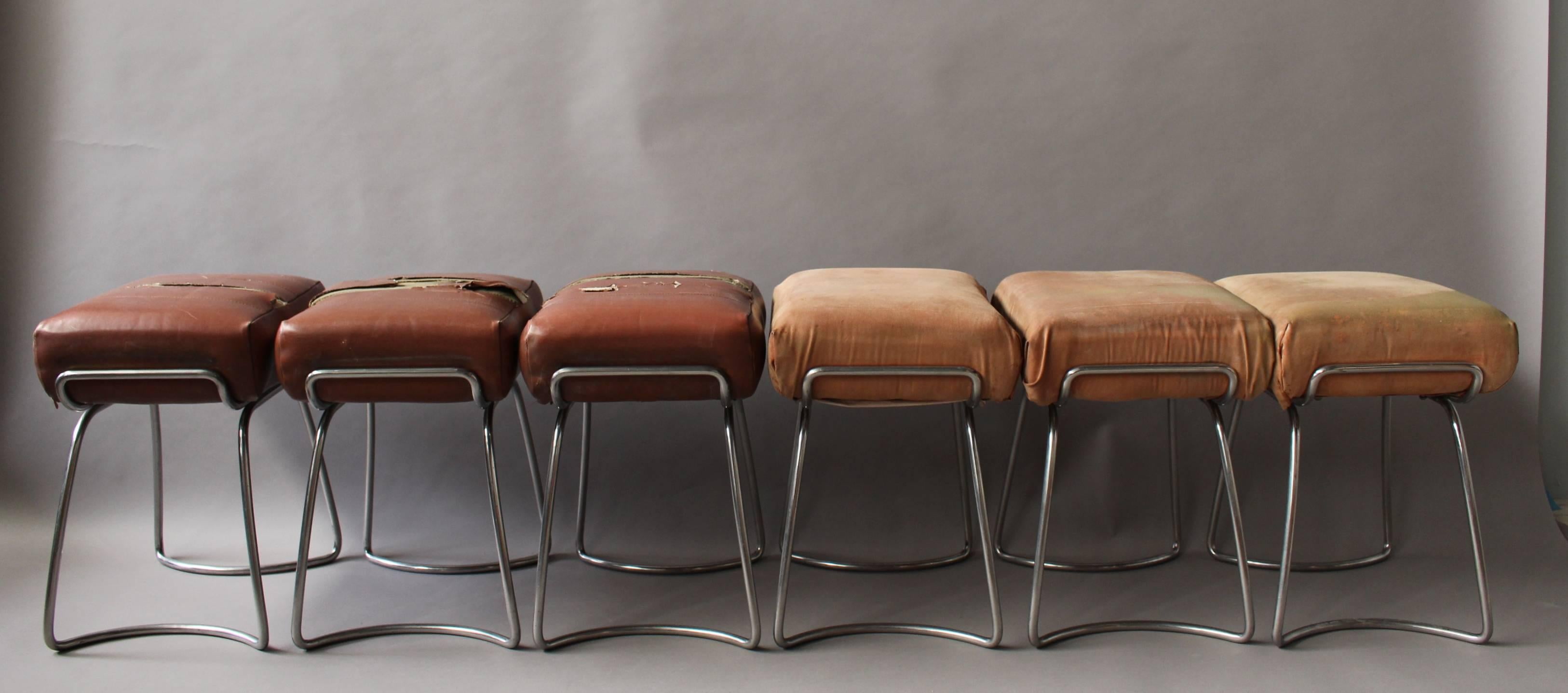 A set of 6 French 1940s tubular chromed base stools.