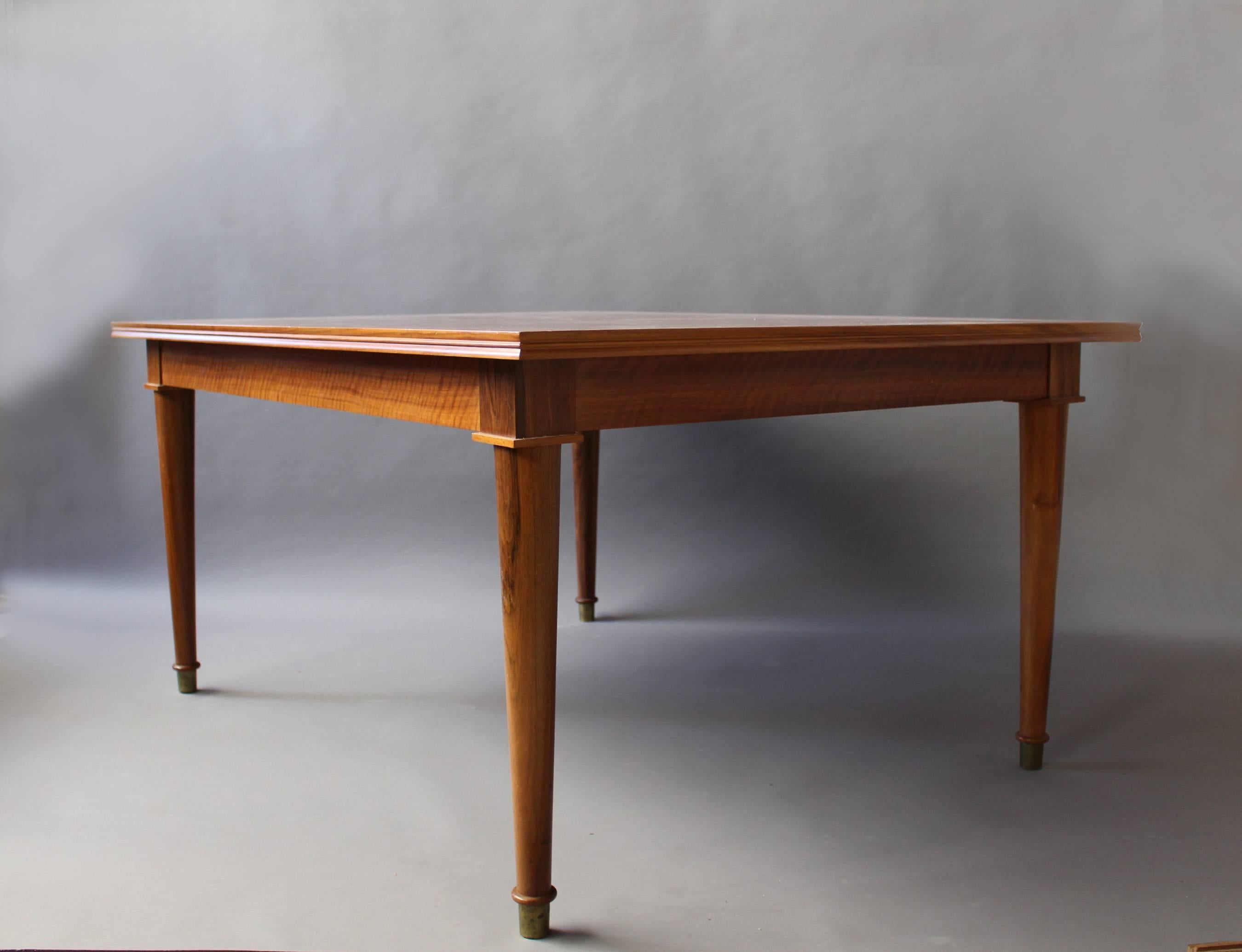 A Fine French Art Deco Extendable Walnut Dining Table by Jules Leleu In Good Condition In Long Island City, NY