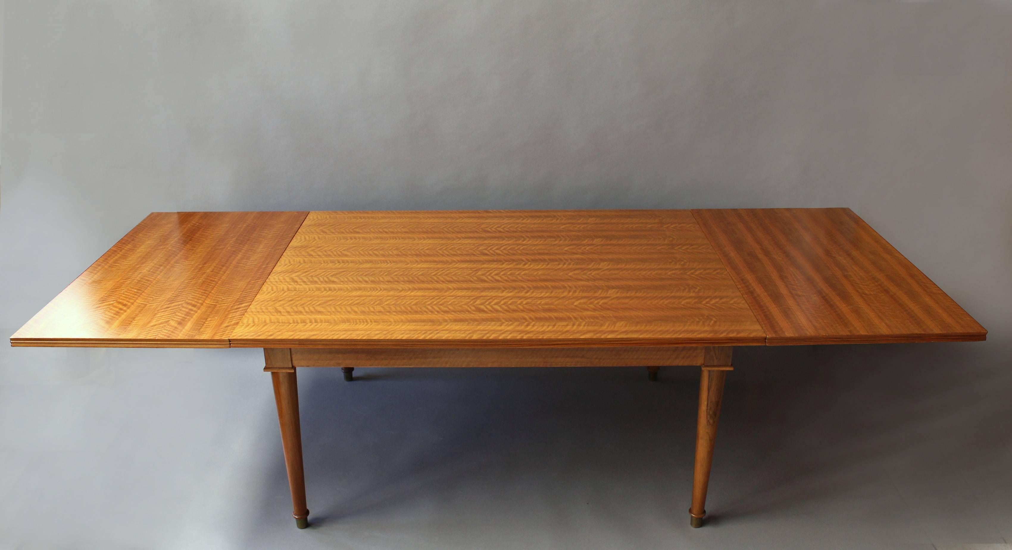 A Fine French Art Deco Extendable Walnut Dining Table by Jules Leleu 2