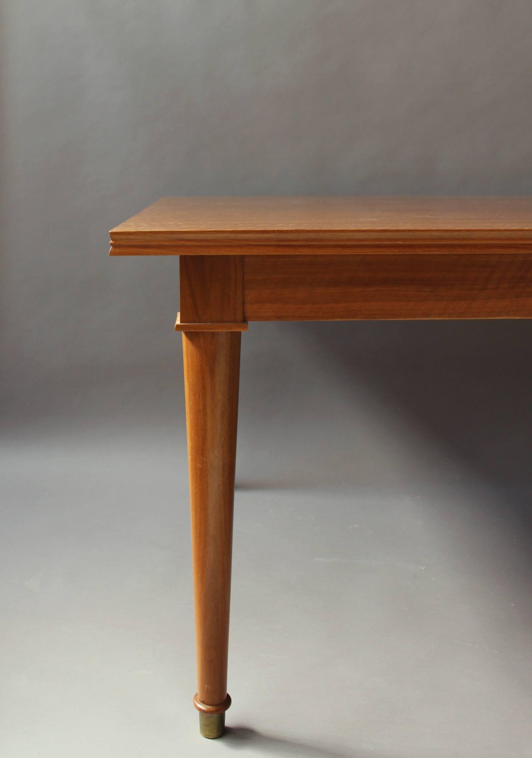 A Fine French Art Deco Extendable Walnut Dining Table by Jules Leleu 4