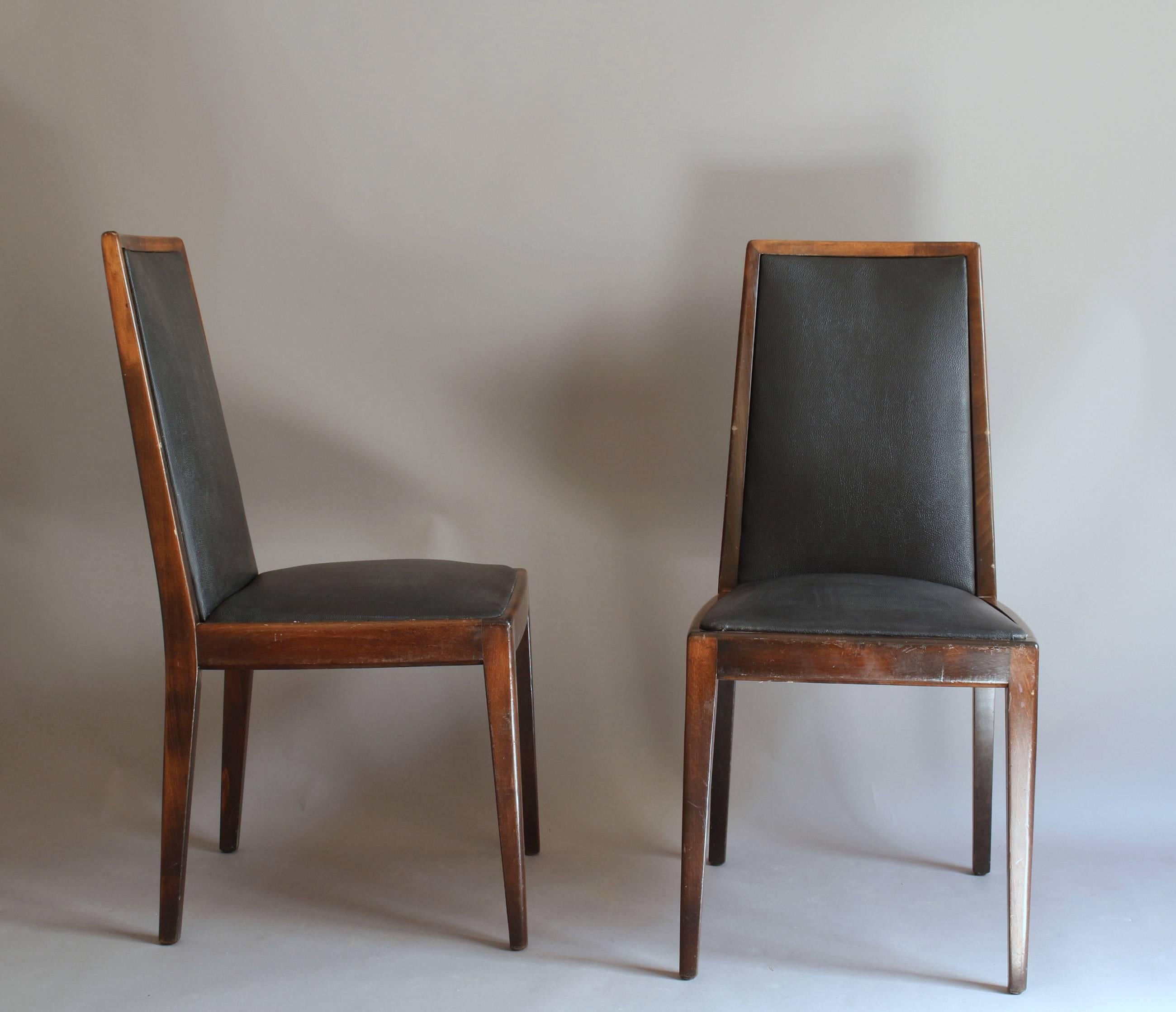 A set of fine 12 Art Deco stained beech dining chairs.
The chairs have been refinished.

