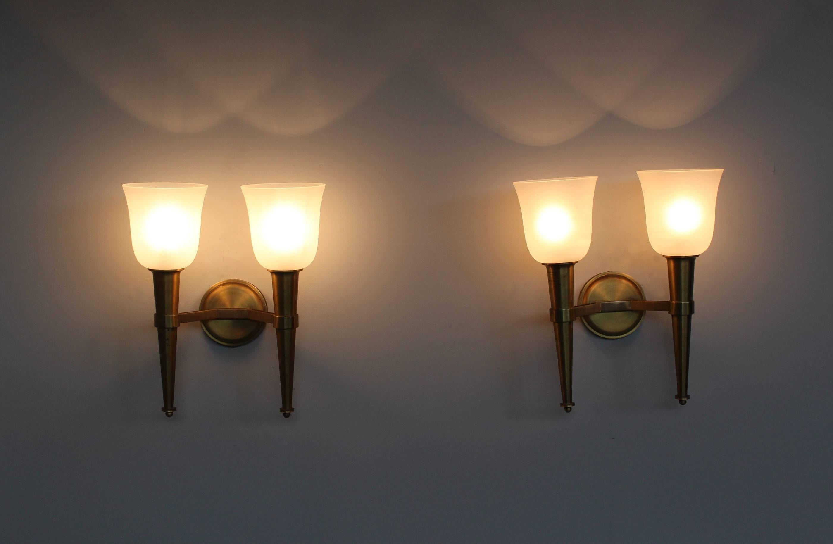In bronze with frosted glass tulip shape shade.
Price is for one pair and includes US re-wiring. Two pairs available.