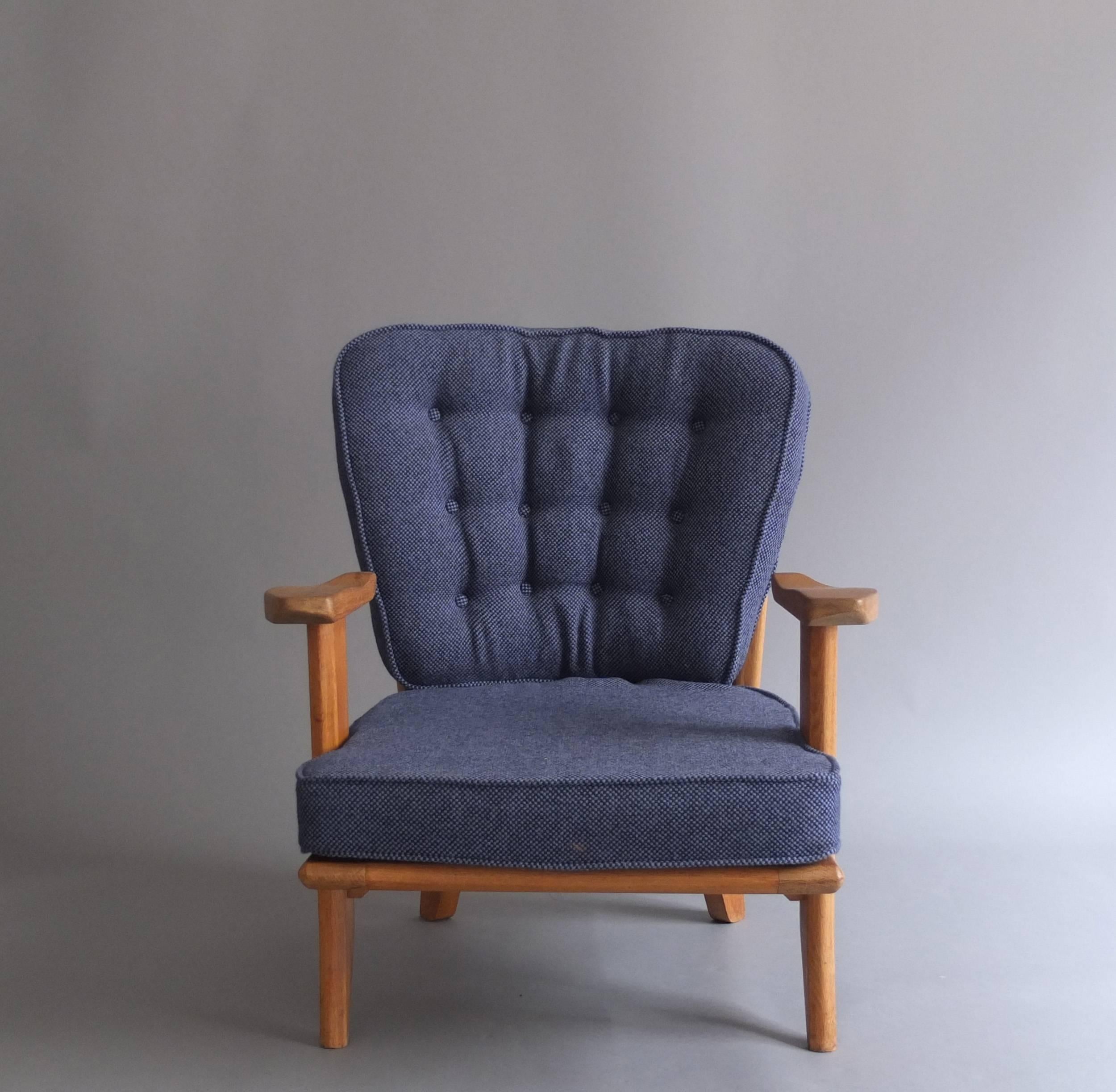 Pair of French 1950s solid oak armchairs by Guillerme & Chambron with their original blue fabric.