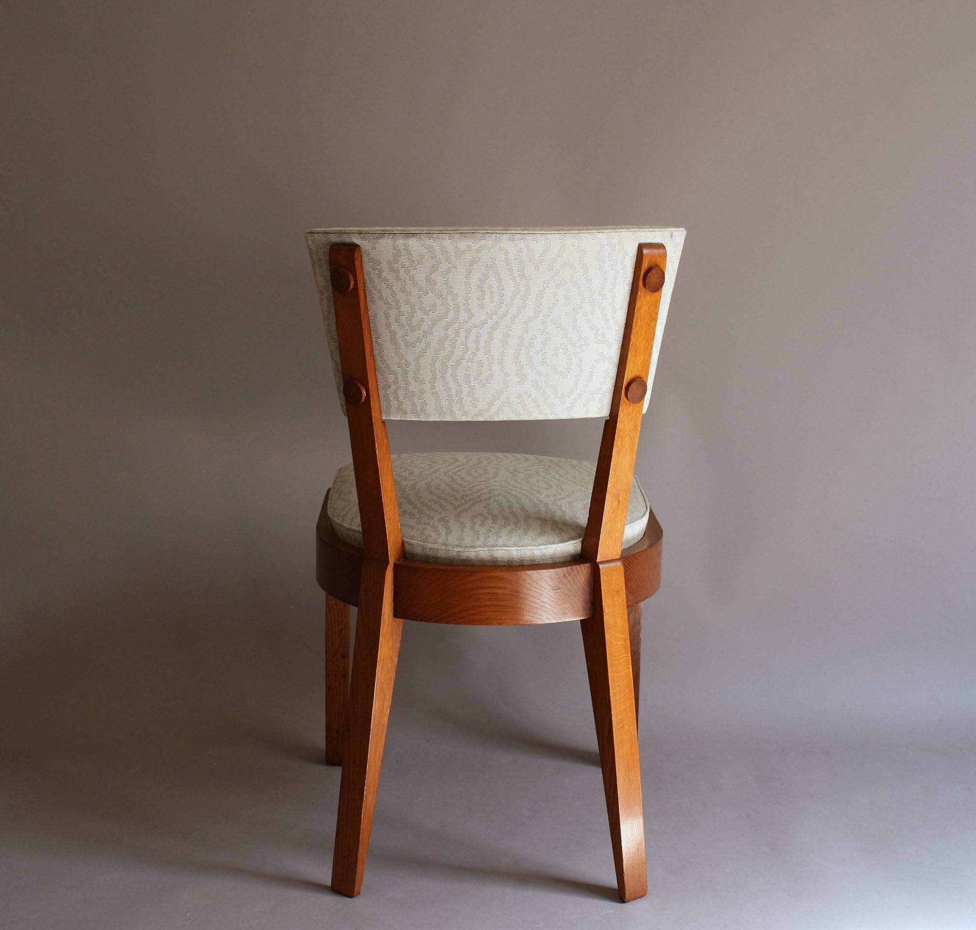 A pair of Fine French Art Deco Oak Chairs by Charles Dudouyt 4