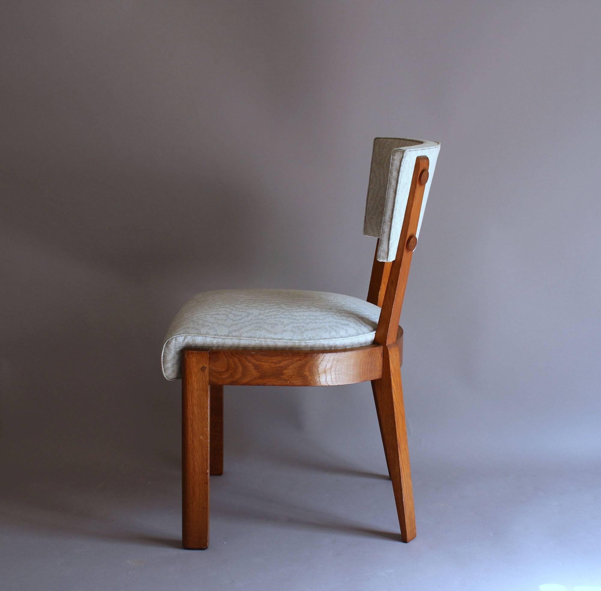 A pair of Fine French Art Deco Oak Chairs by Charles Dudouyt 2