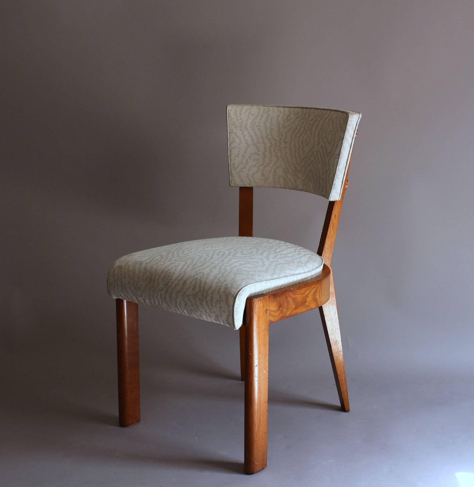 A pair of Fine French Art Deco Oak Chairs by Charles Dudouyt 1