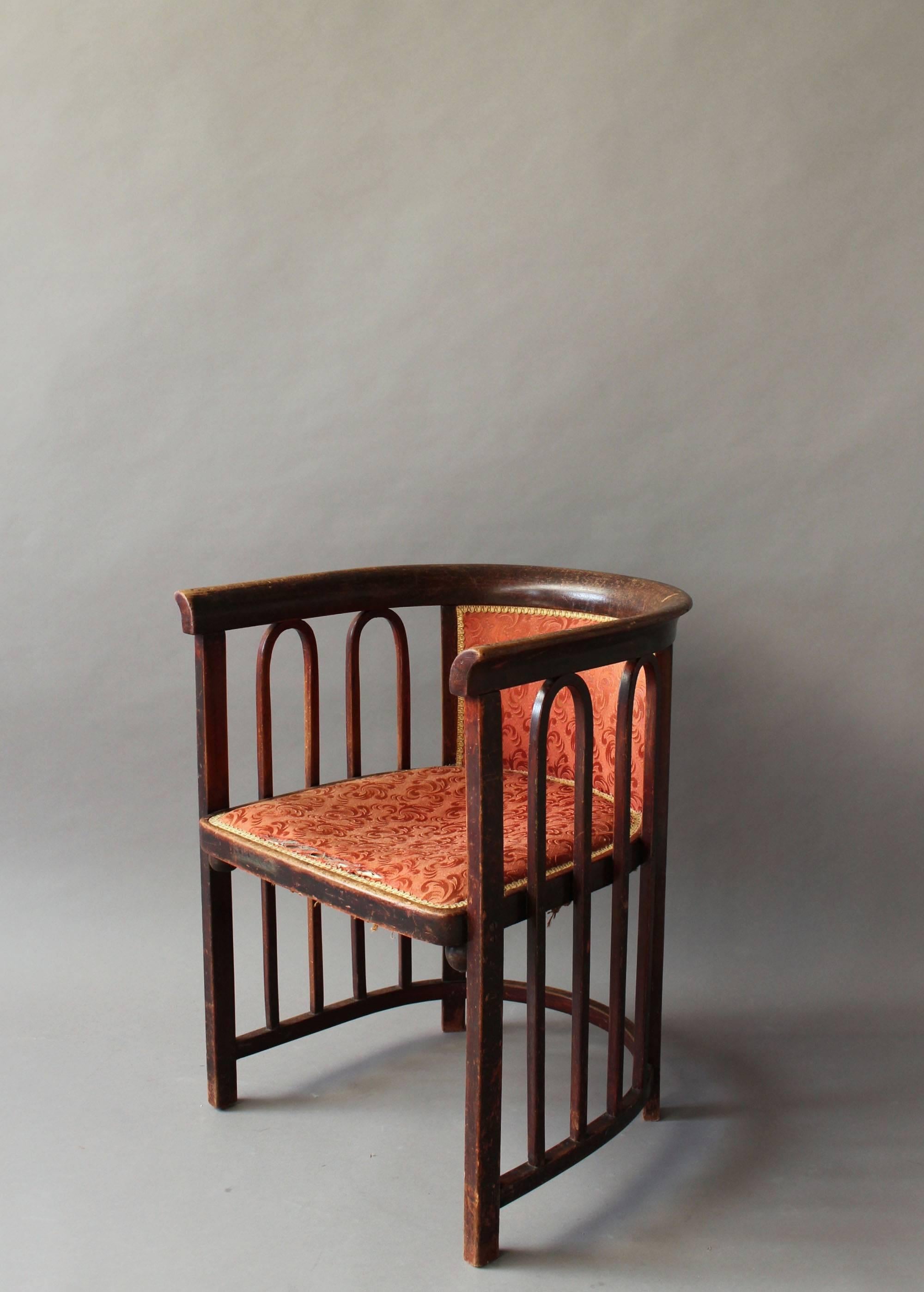 A fine Austrian Art Nouveau stained bentwood armchair in the manner of Josef Hoffmann
