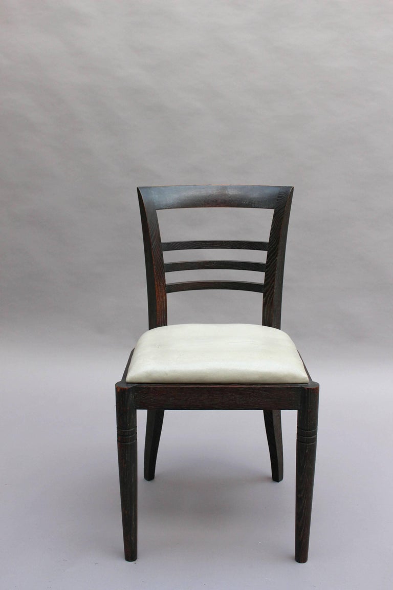 Mid-20th Century Set of Eight Fine French Art Deco Ebonized Lime Oak Dining Chairs For Sale
