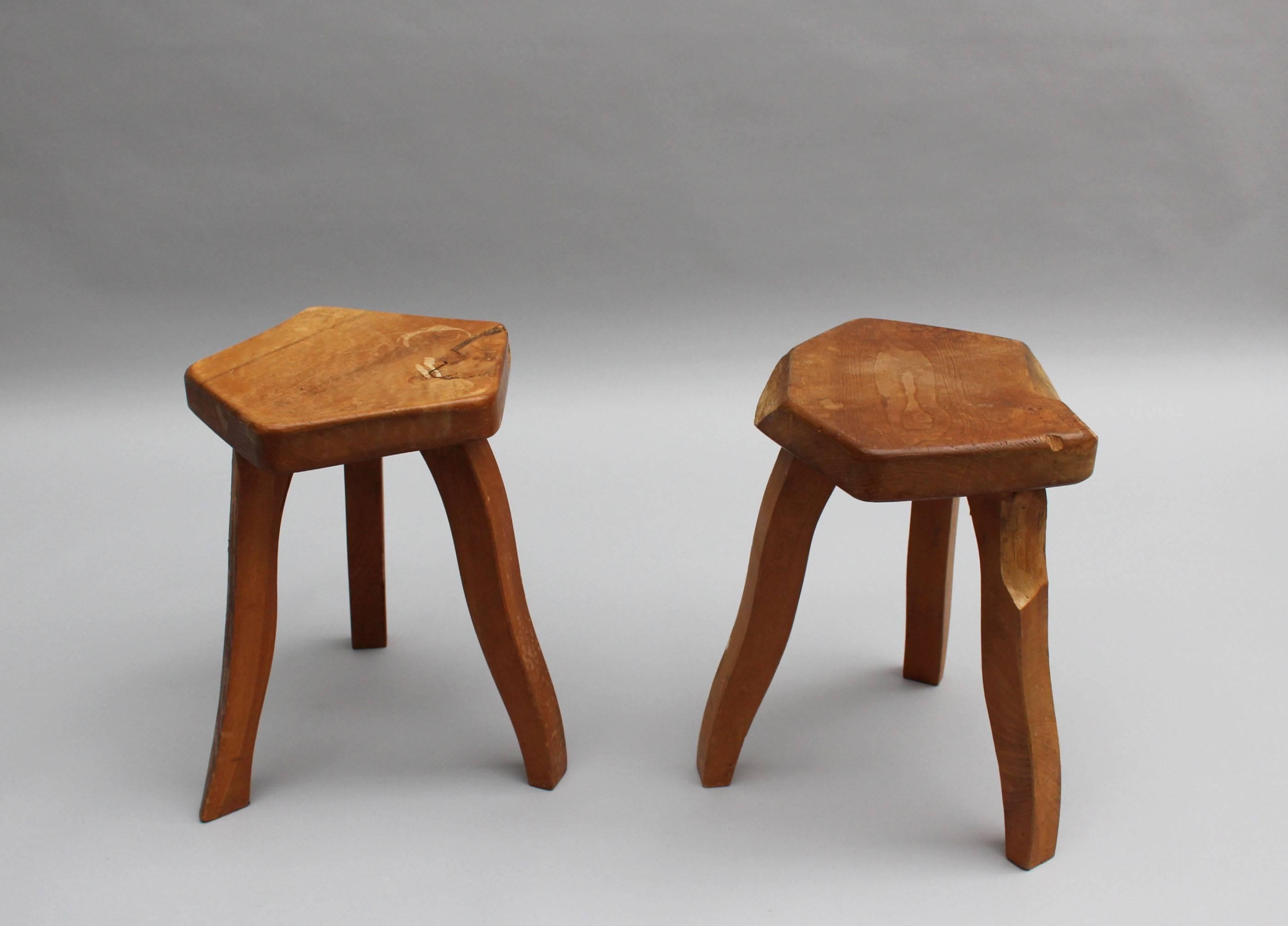 Two mid-century free-form tripod base oak stools with an organic hexagonal shape seat.
Price is per stool.