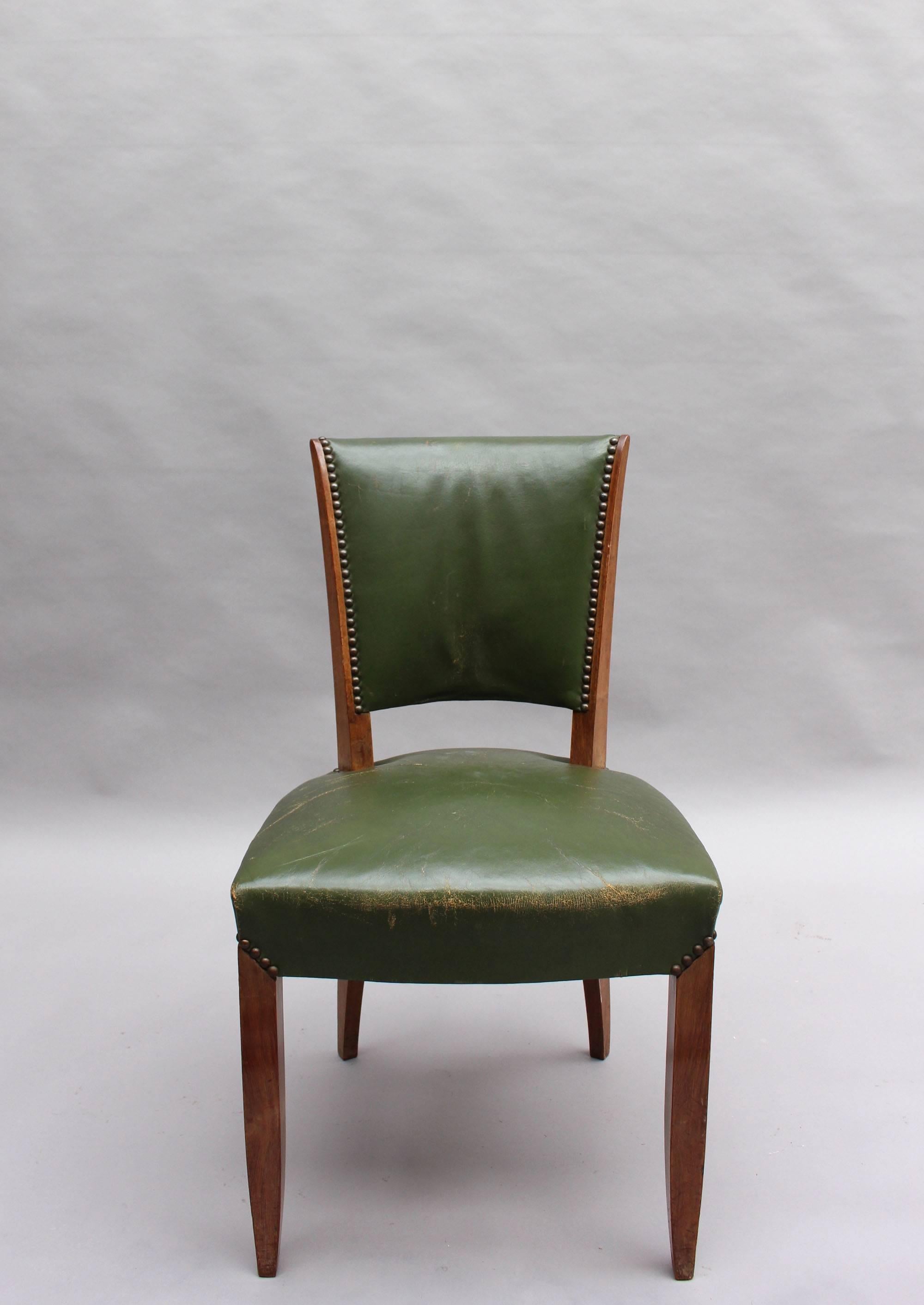 A set of four fine French Art Deco rosewood dining/side chairs. (Four armchairs are also available, see last pictures)
