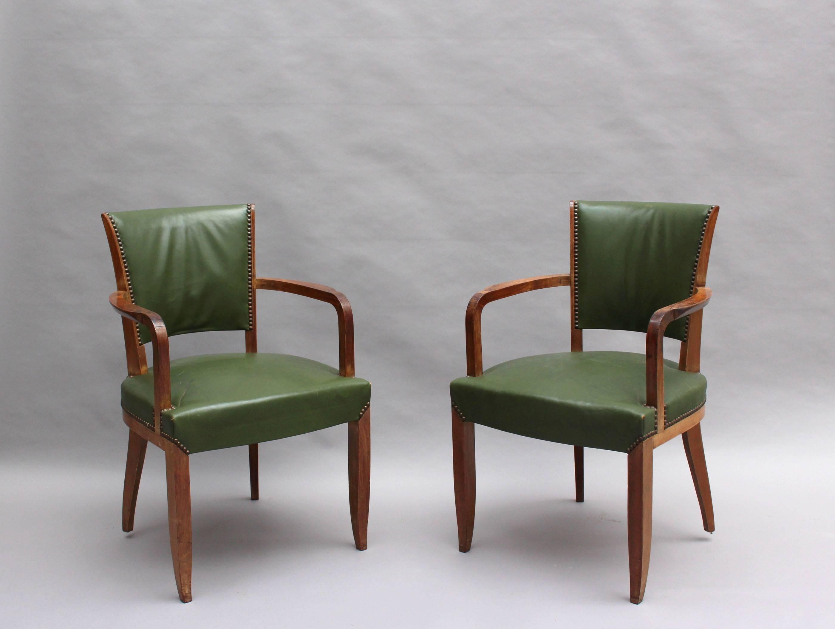 A set of four Fine French Art Deco rosewood armchairs.
 