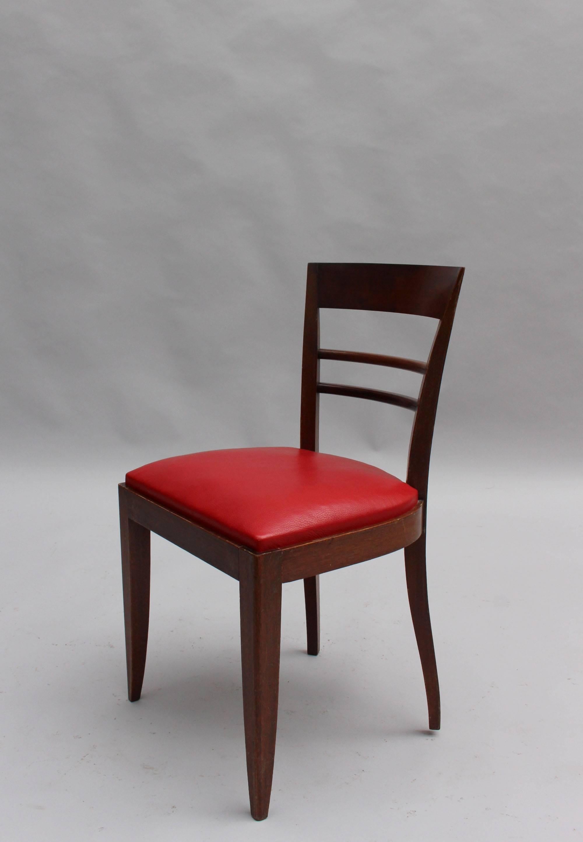 Milieu du XXe siècle Ensemble de 10 chaises de salle à manger Art Déco françaises en acajou (8 côtés et 2 bras) en vente