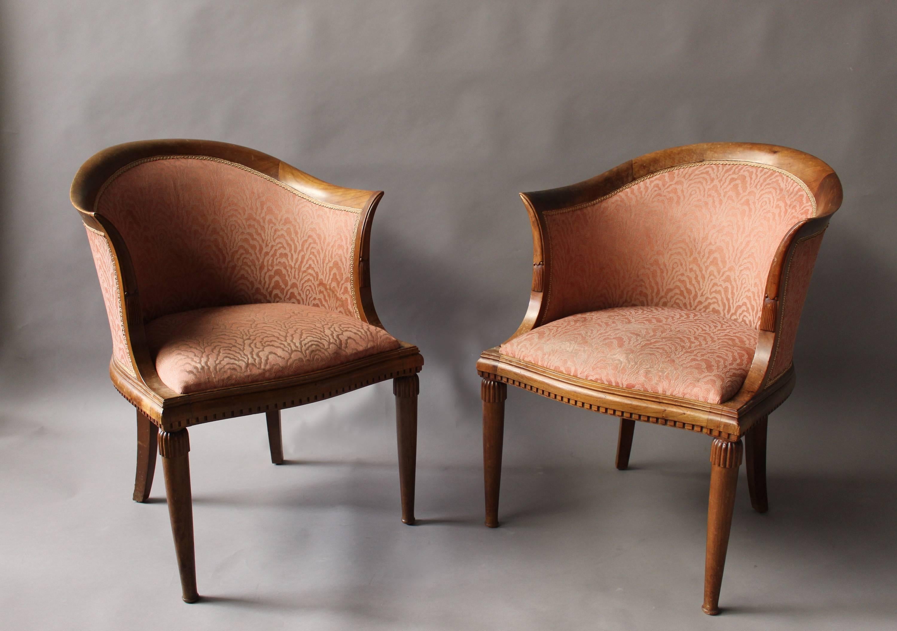 Pair of Fine French Art Deco mahogany armchairs in the manner of Maurice Dufrene, circa 1925.