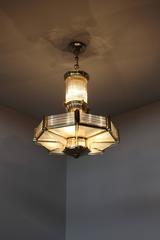 A Fine French Art Deco Octagonal Bronze and Glass Chandelier by Petitot