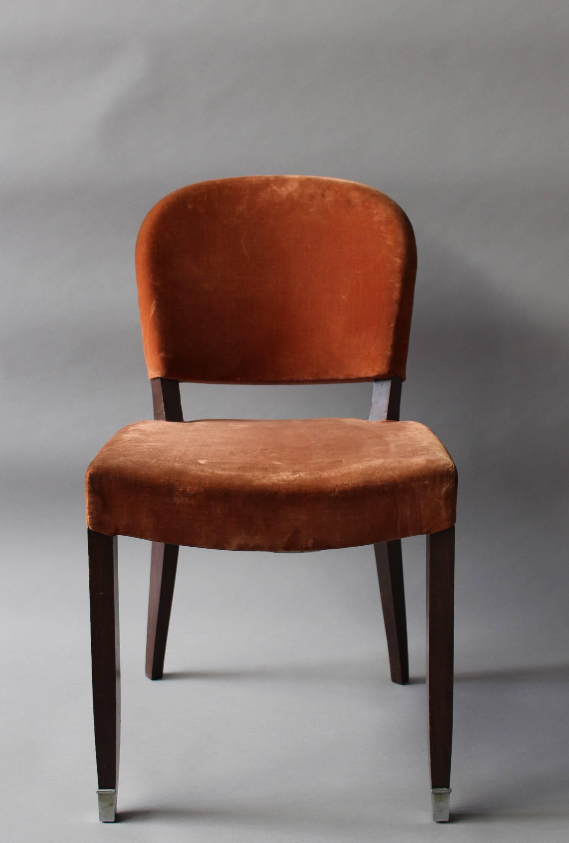 A fine French Art Deco chair by Jules Leleu with elegant sabots on front legs.