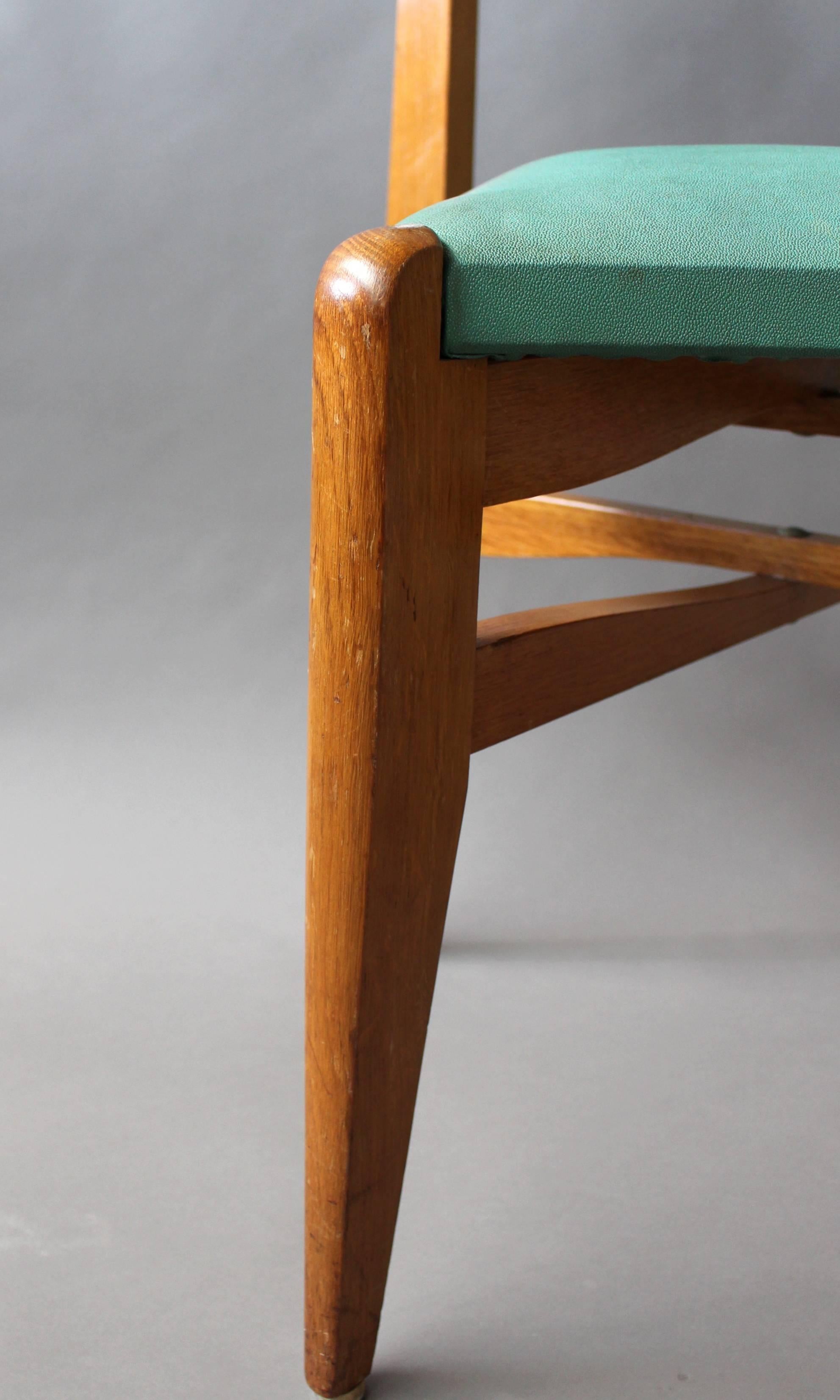 A set of 6 French 1950's Oak Chairs 5